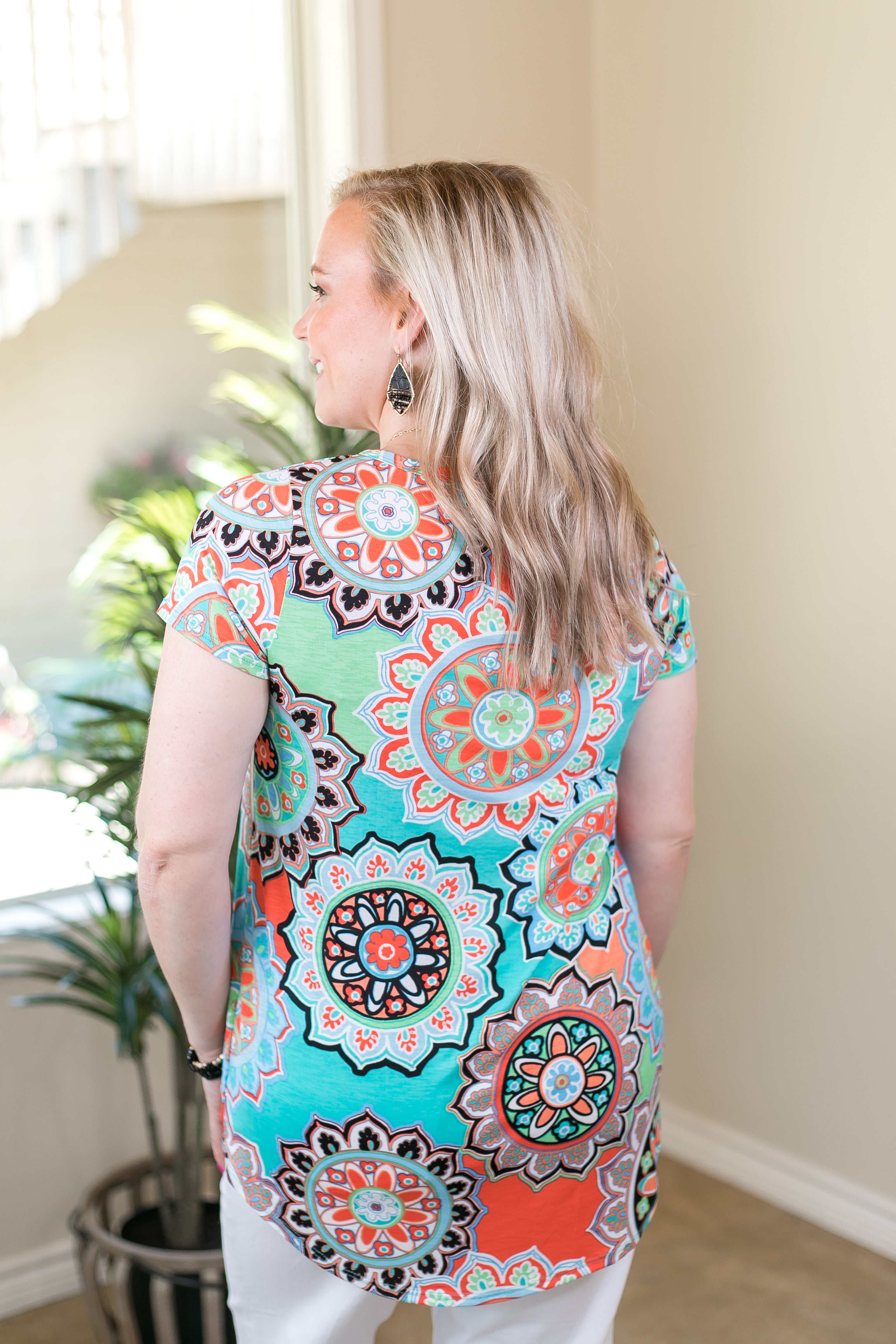 Last Chance Size Small | Take A Glisten Geometric Floral Print Top with Sequin Pocket in Turquoise