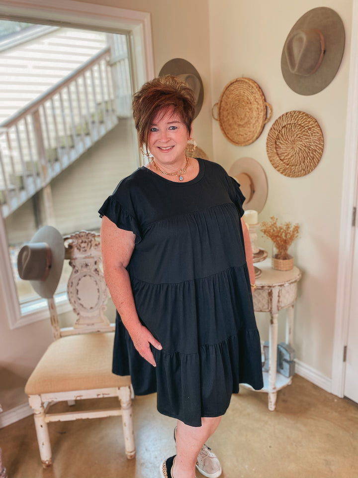 Instant Attraction Solid Ruffle Tiered Dress in Black - Giddy Up Glamour Boutique
