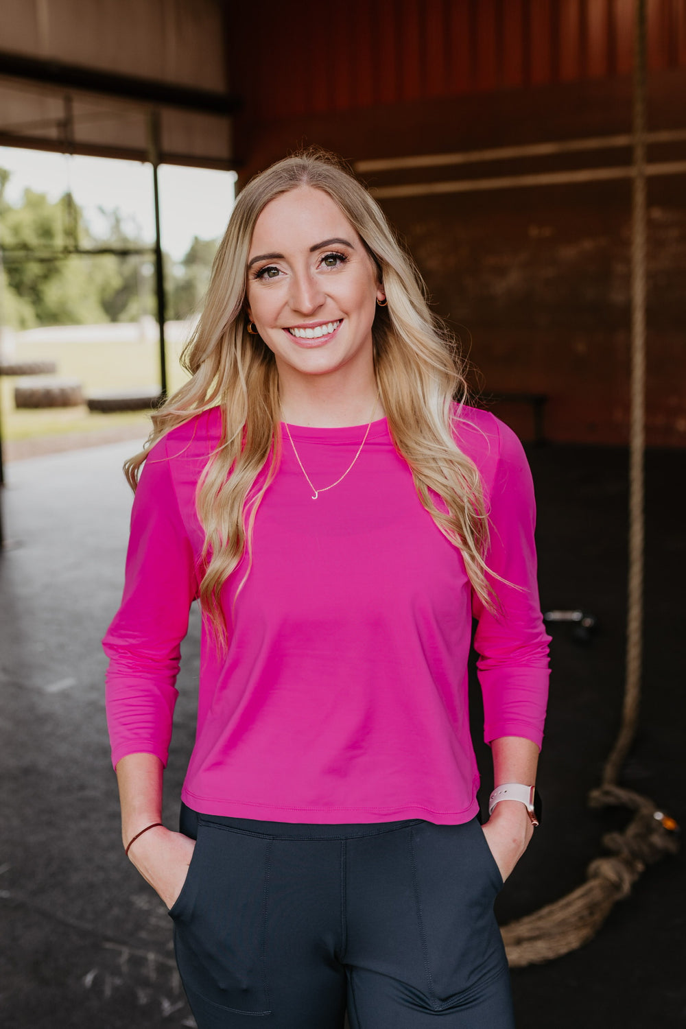 Get Moving Long Sleeve Cropped Top in Fuchsia - Giddy Up Glamour Boutique