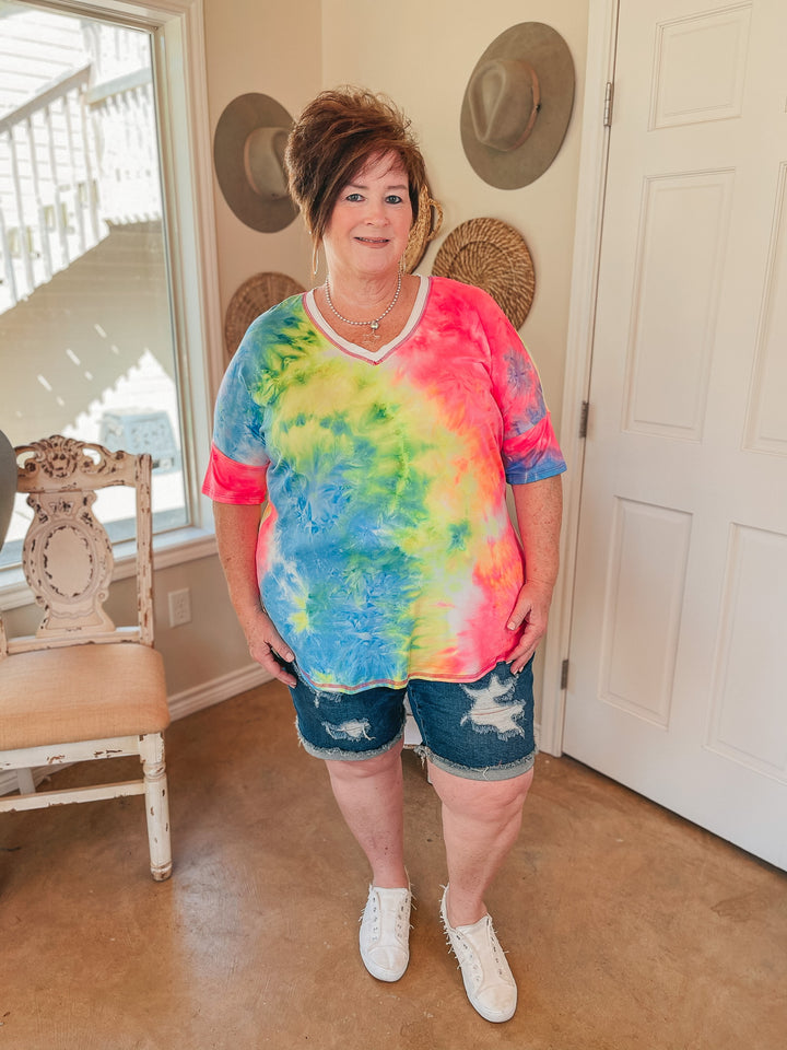 Last Chance Size Small & Med. | Bright Forecasts Tie Dye V Neck Top in Neon Pink, Yellow, and Blue - Giddy Up Glamour Boutique