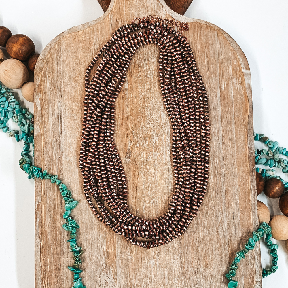 Three Strands of Long Faux Navajo Pearls in Copper Tone - Giddy Up Glamour Boutique