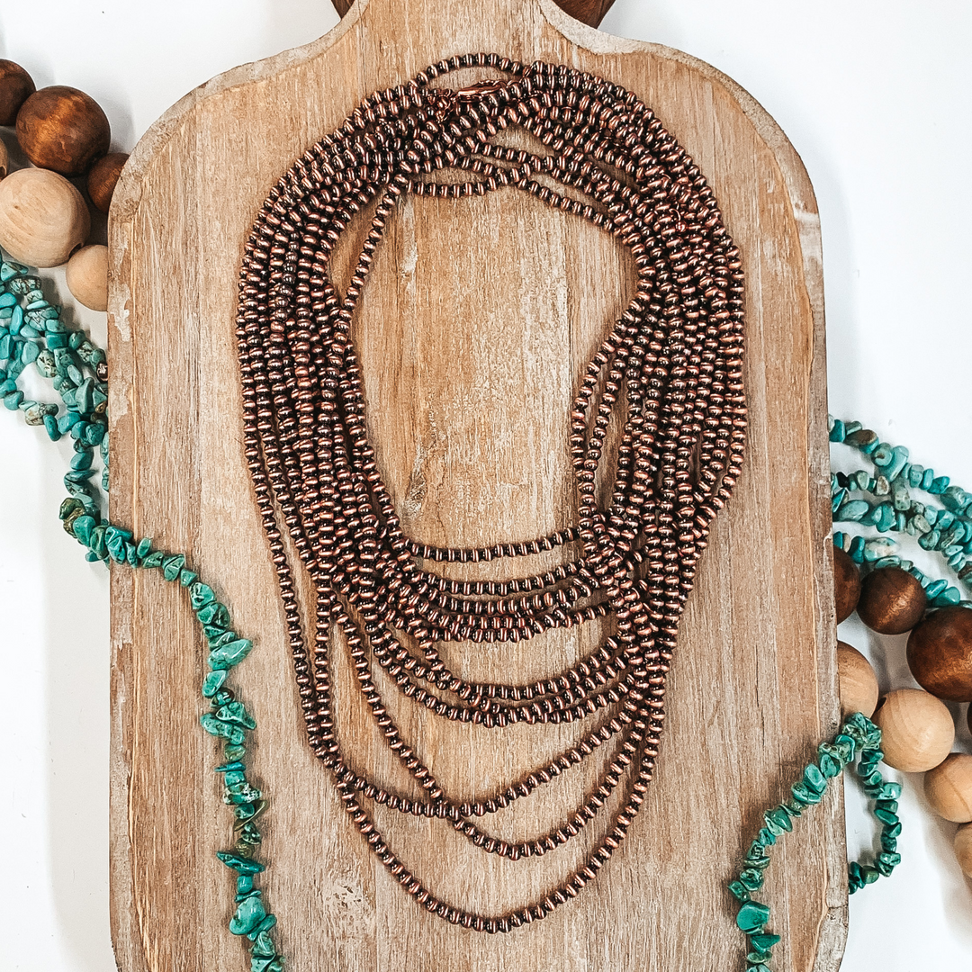 Three Strands of Long Faux Navajo Pearls in Copper Tone - Giddy Up Glamour Boutique