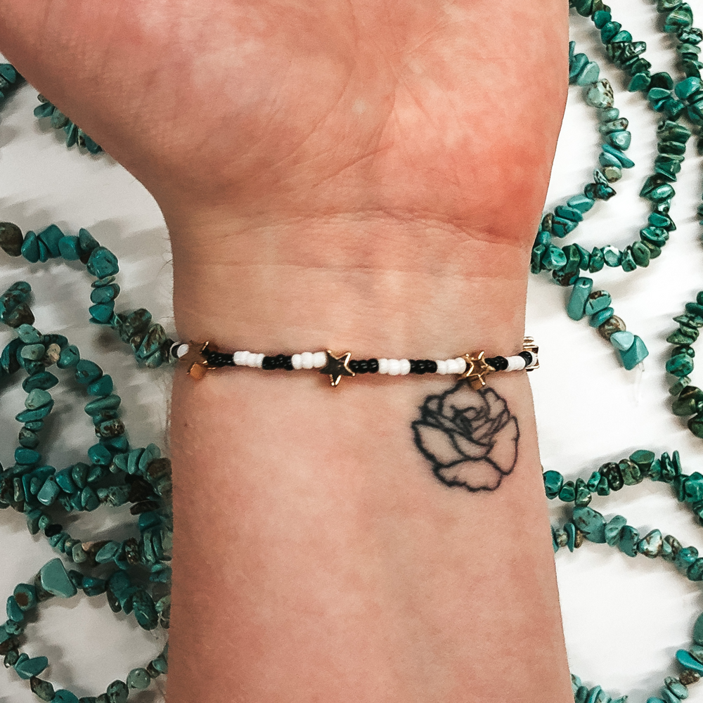 Written in the Stars Black and White Beaded Bracelet with Gold Stars - Giddy Up Glamour Boutique