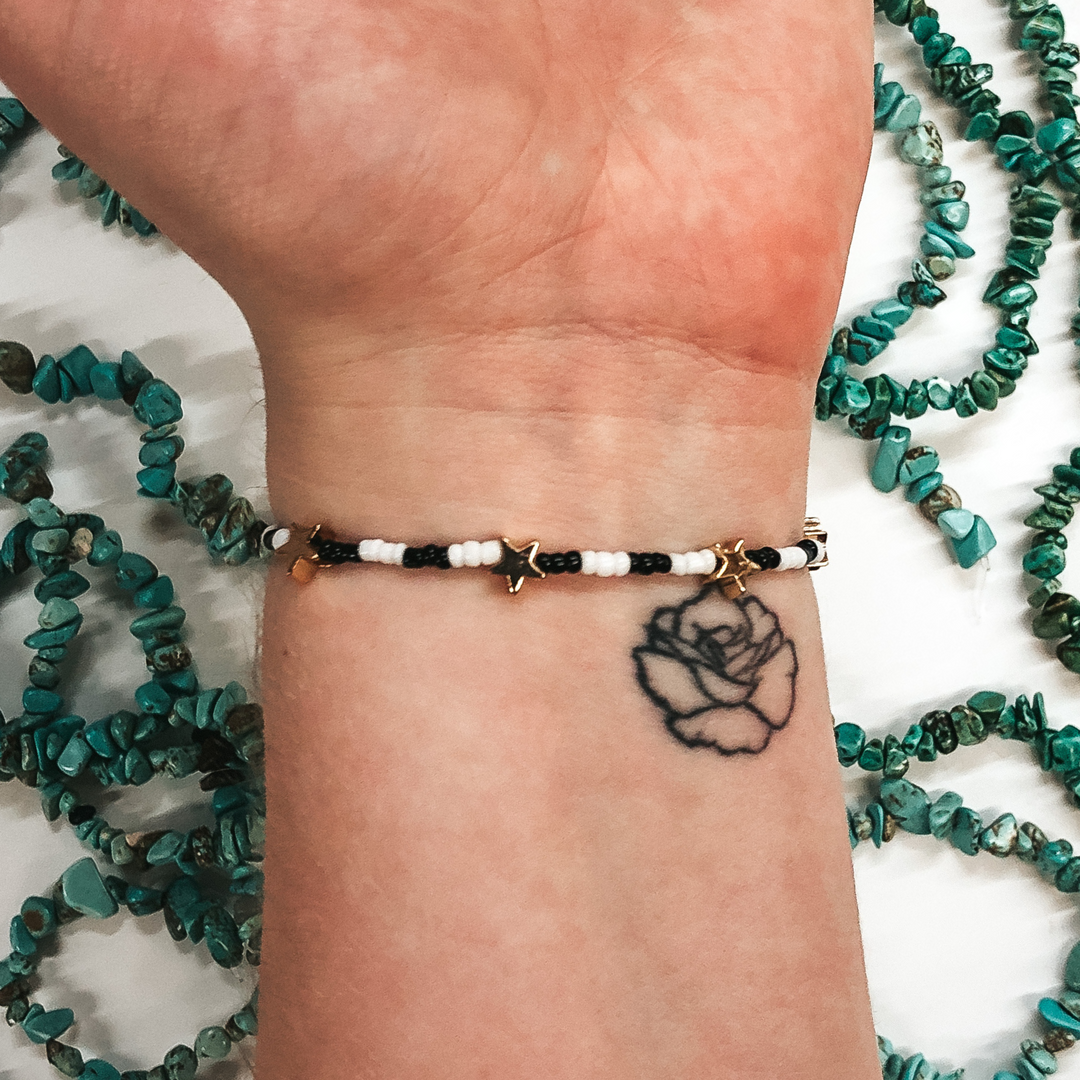 Written in the Stars Black and White Beaded Bracelet with Gold Stars - Giddy Up Glamour Boutique