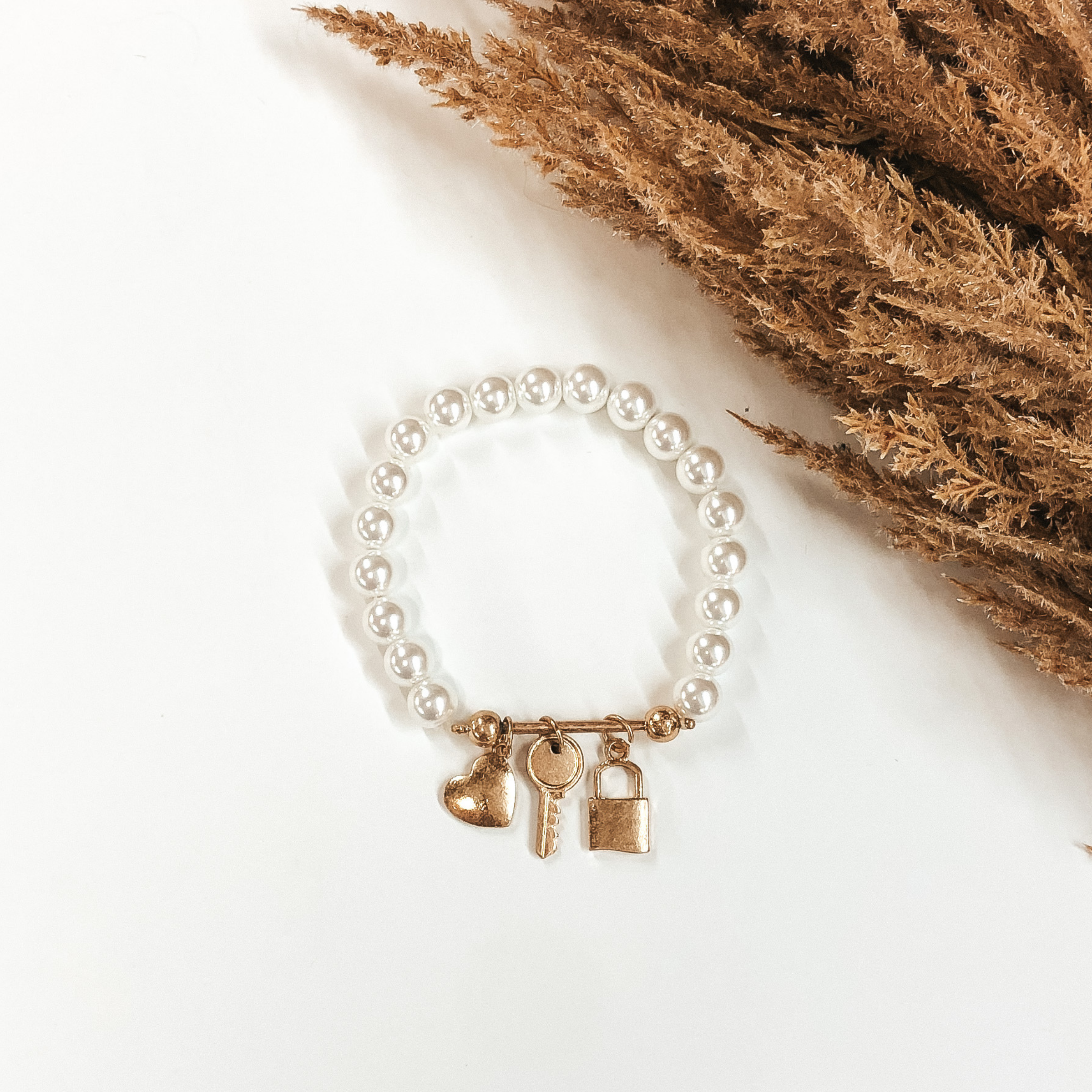 Lock Up Your Heart Bracelet in White/Gold - Giddy Up Glamour Boutique