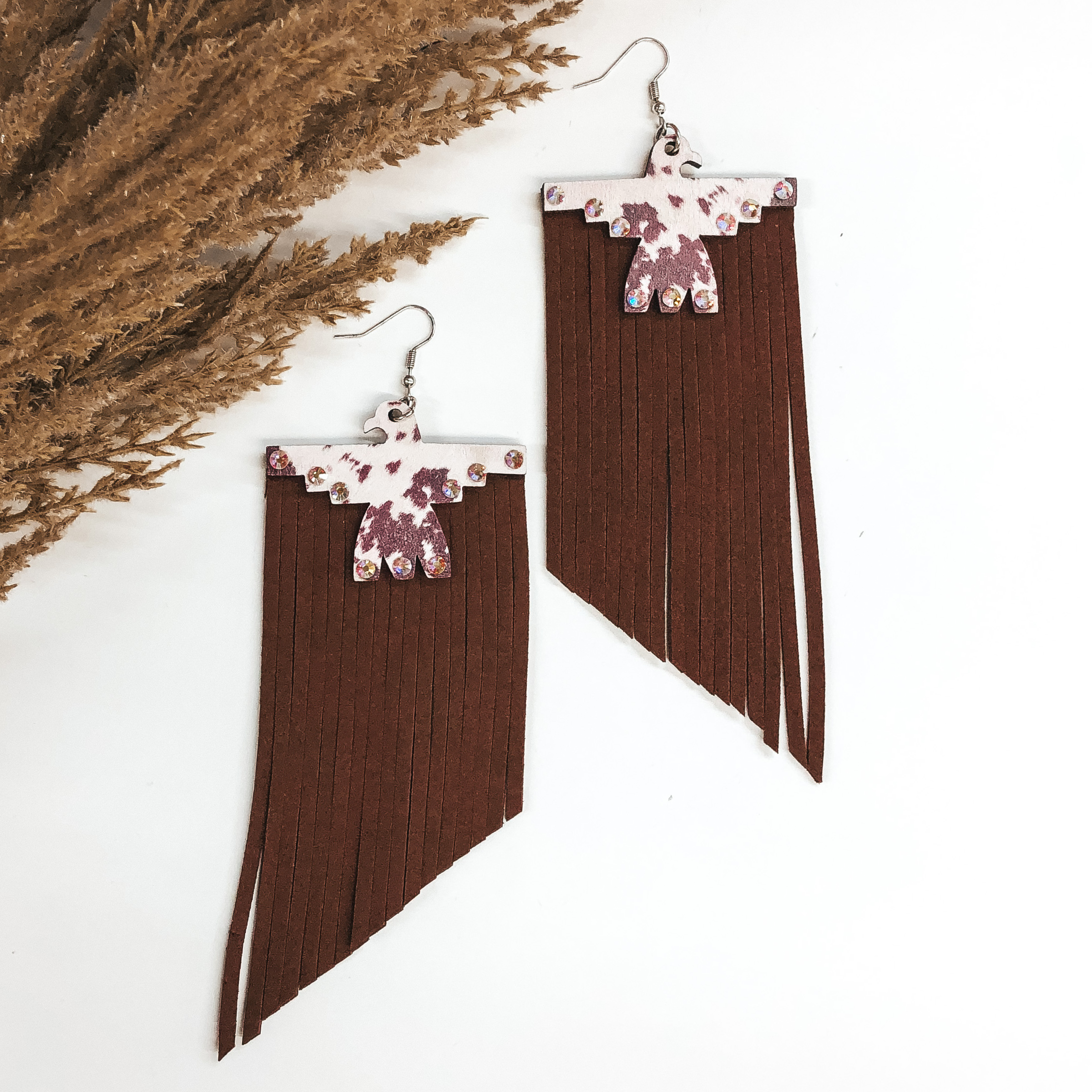 Cow Print Thunderbird Wood Earrings with Brown Tassels - Giddy Up Glamour Boutique