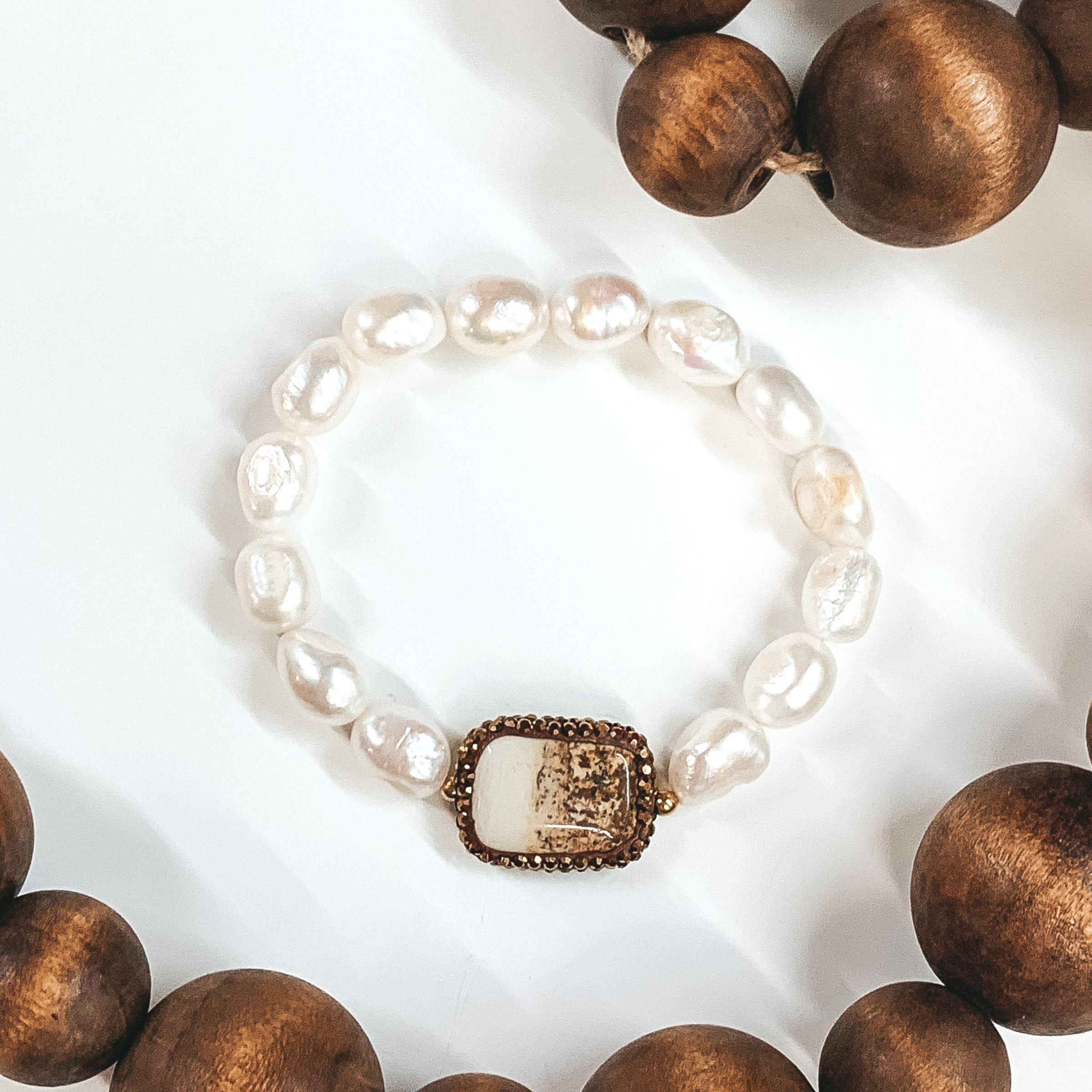 pearl like beaded bracelet with brown stone and brown crystals