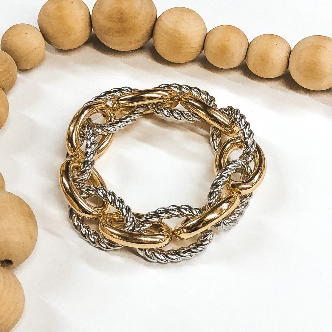 gold and silver thick chain link bracelet 