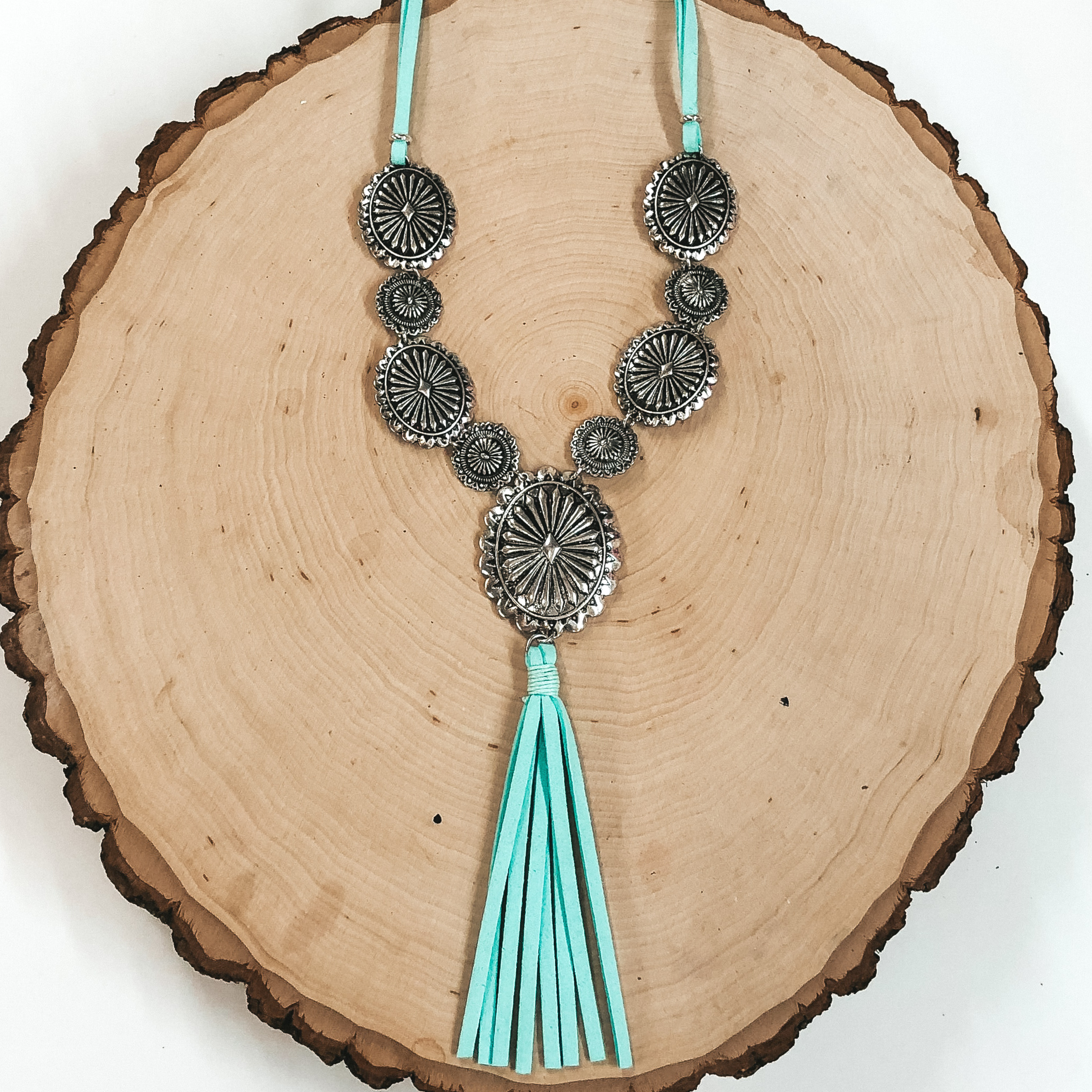silver conchos on light blue leather necklace