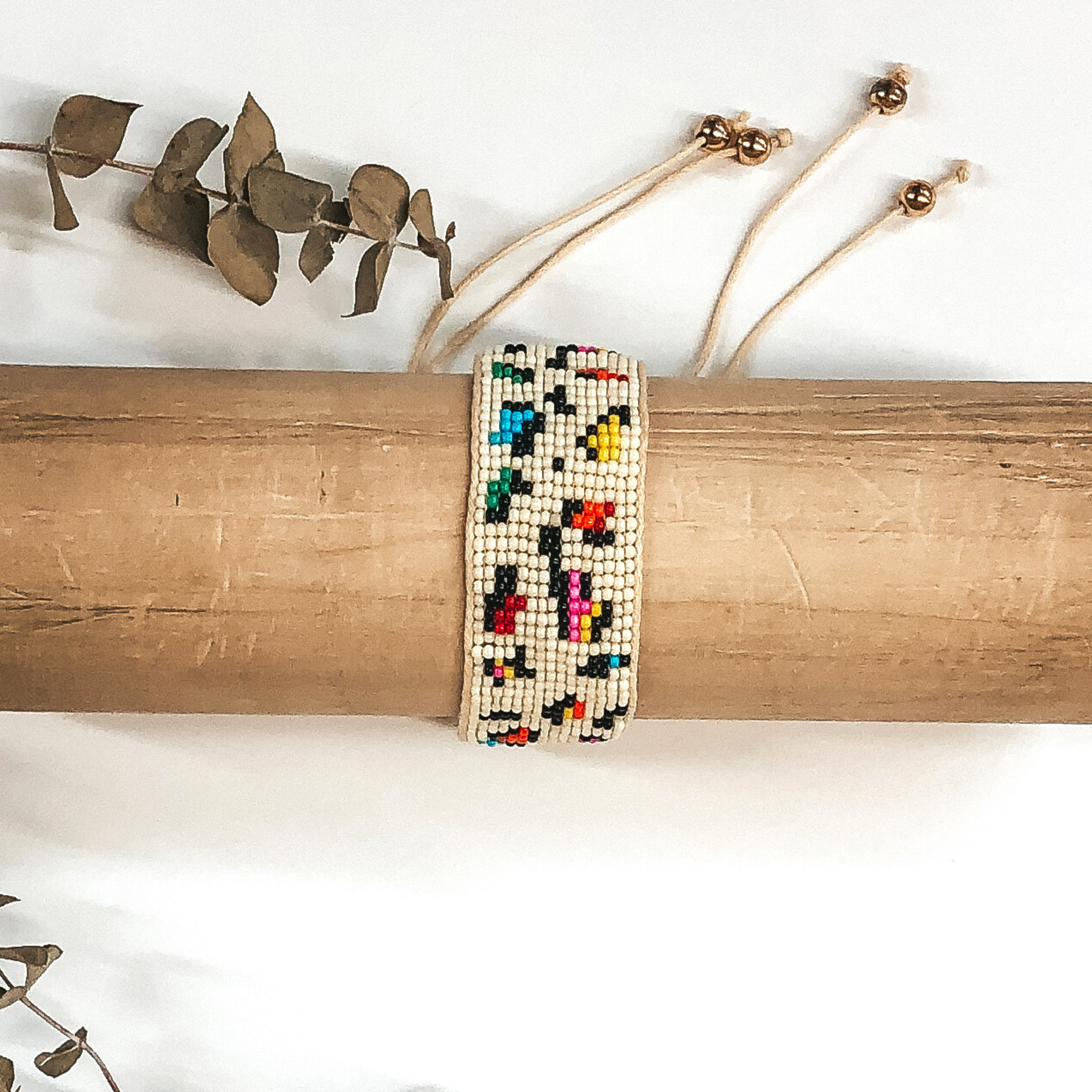 ivory beaded bracelet with colored spots