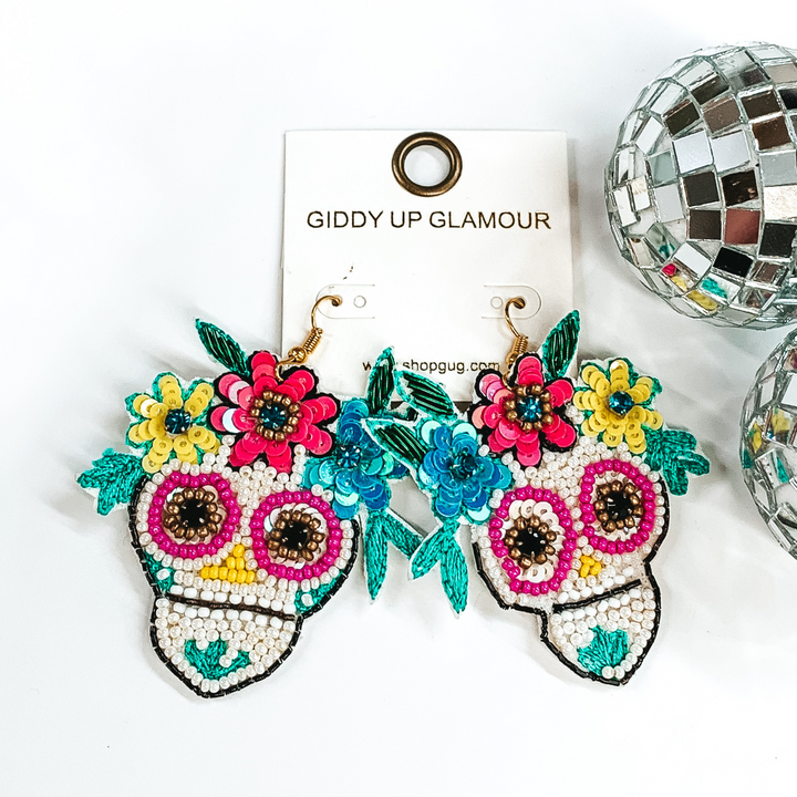 white sugar skull beaded earrings with flowers