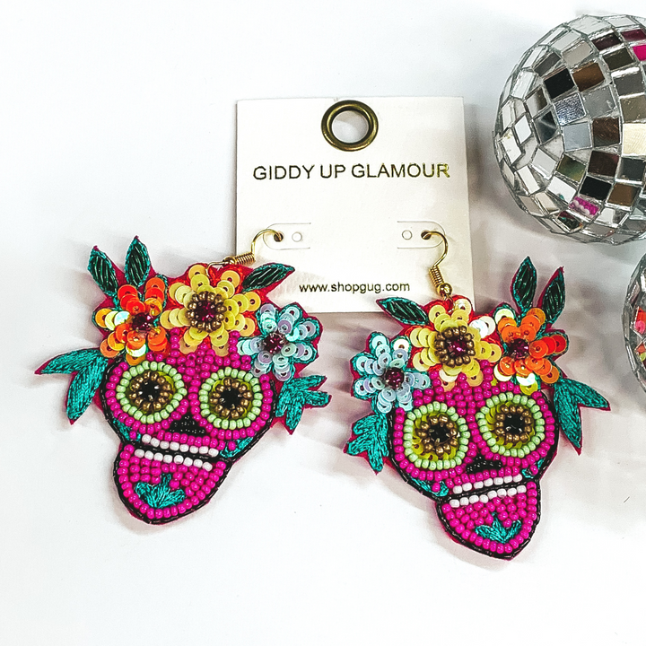 fuchsia beaded sugar skull earring with flowers