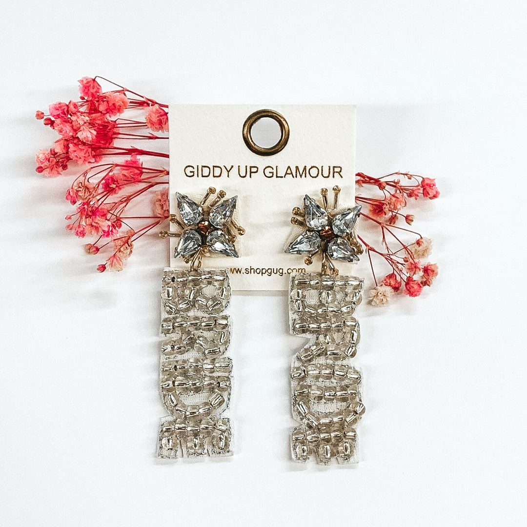 crystal cluster studs with silver beaded "bride" hanging down from the cluster