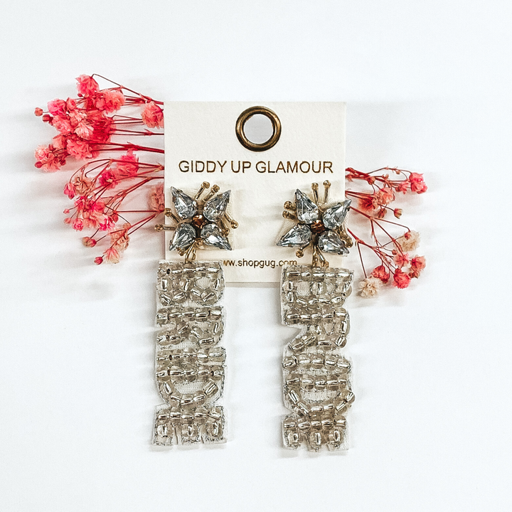 crystal cluster studs with silver beaded "bride" hanging down from the cluster