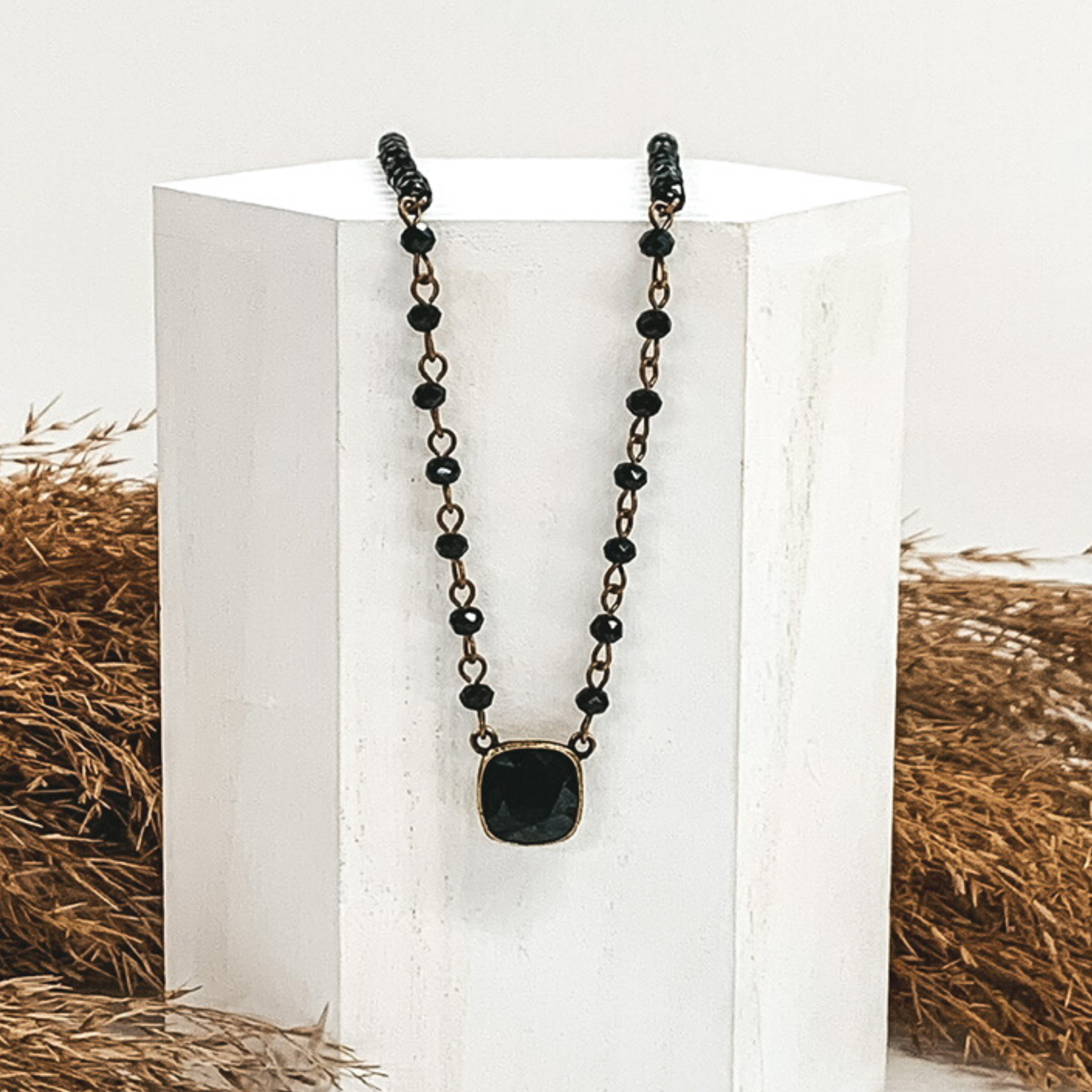 black  pearl beaded and bronze chained adjustable necklace withblack crystal