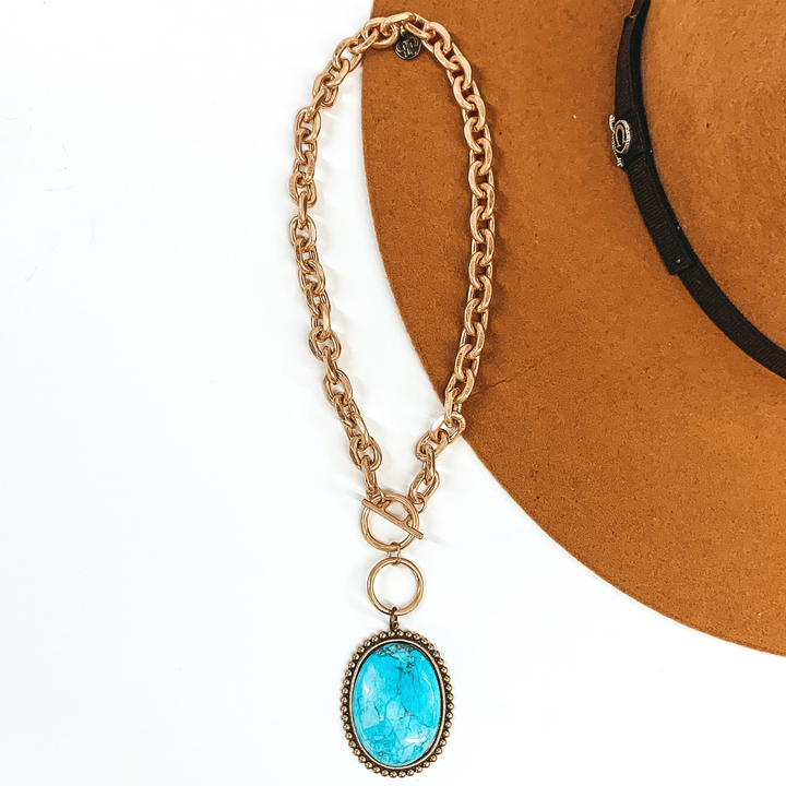 Pink Panache | Large Bronze Oval Turquoise Cabochon Pendant on a Matte Gold Chain Link Necklace with Toggle Front - Giddy Up Glamour Boutique