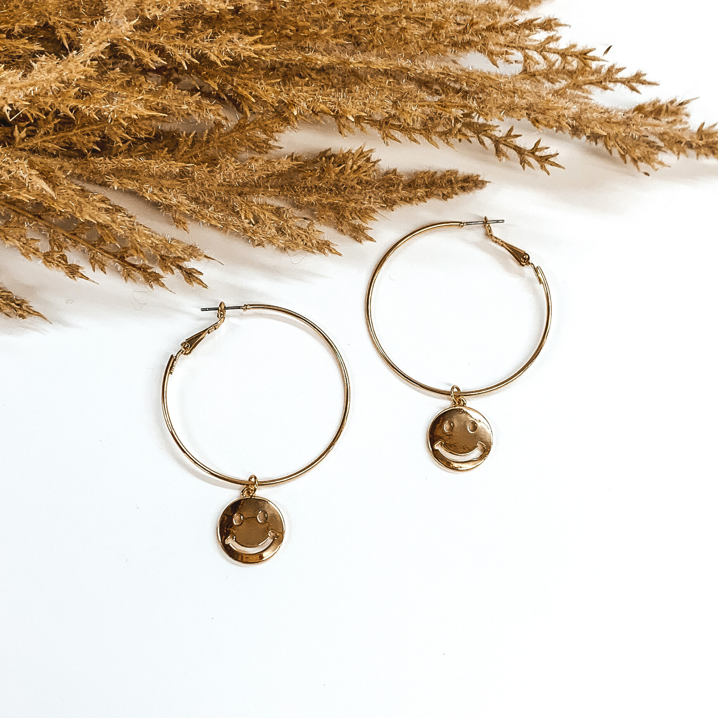 Turn That Frown Upside Down Large Hoop Earrings in Gold - Giddy Up Glamour Boutique
