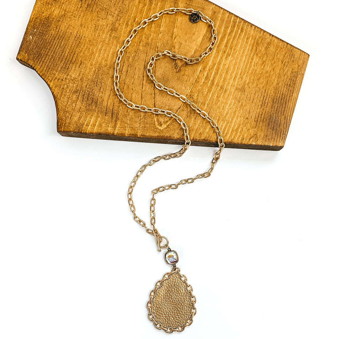 Pink Panache | Long Gold Chain Necklace with AB Cushion Cut Crystal and Gold Chained Rimmed Leather Teardrop Pendant in Gold - Giddy Up Glamour Boutique