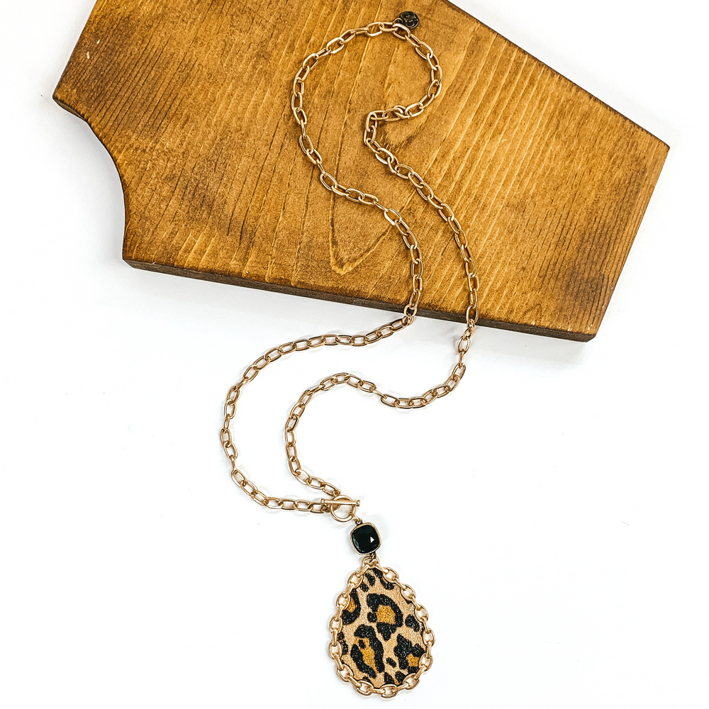 Pink Panache | Long Gold Chain Necklace with Black Cushion Cut Crystal and Gold Chained Rimmed Leather Teardrop Pendant in Leopard Print - Giddy Up Glamour Boutique
