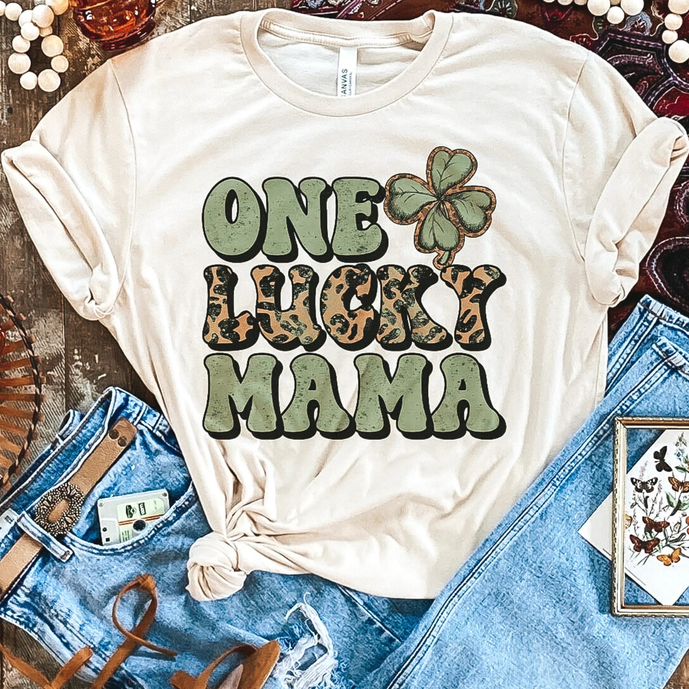 Online Exclusive | One Lucky Mama Short Sleeve Leopard and Green Graphic Tee in Cream - Giddy Up Glamour Boutique