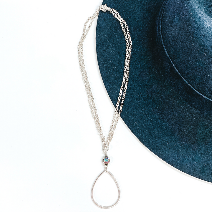 Pink Panache | Silver Open Teardrop Pendant with AB Cushion Cut Crystal on a Double Silver Chained Necklace with Toggle Front - Giddy Up Glamour Boutique
