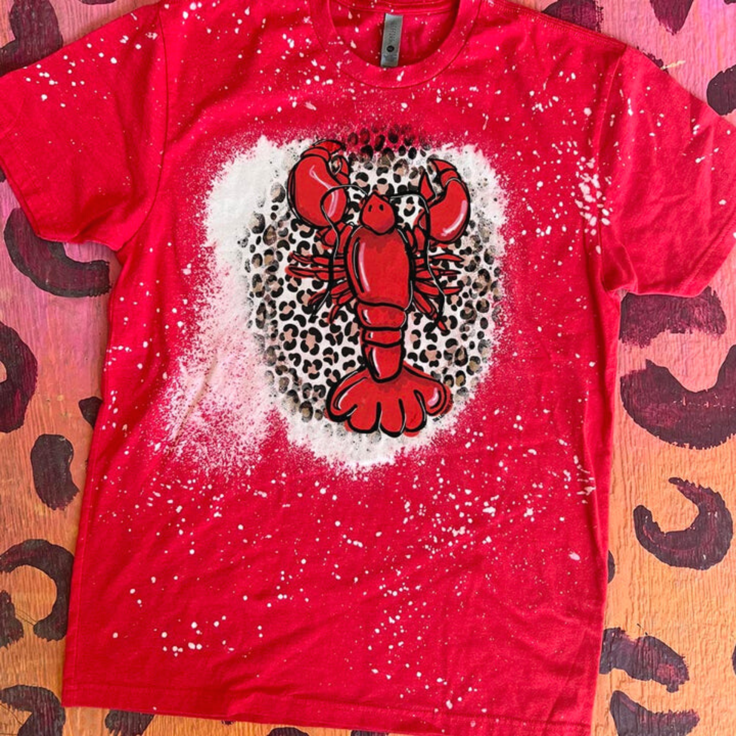 Online Exclusive | Creole King Short Sleeve Bleached Leopard Crawfish Graphic Tee in Red - Giddy Up Glamour Boutique
