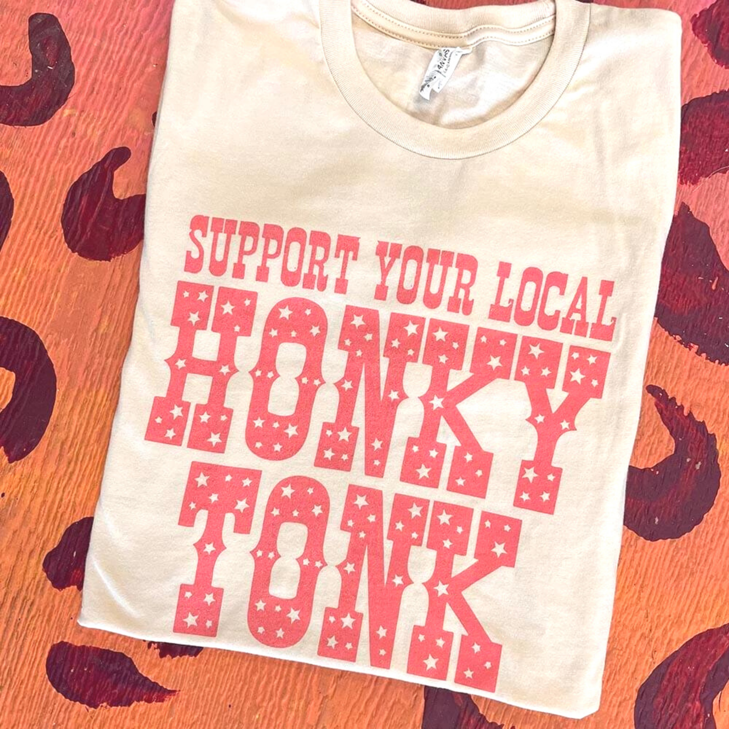 Online Exclusive | Support Your Local Honky Tonk Short Sleeve with Pink  Ink Graphic Tee in Cream - Giddy Up Glamour Boutique