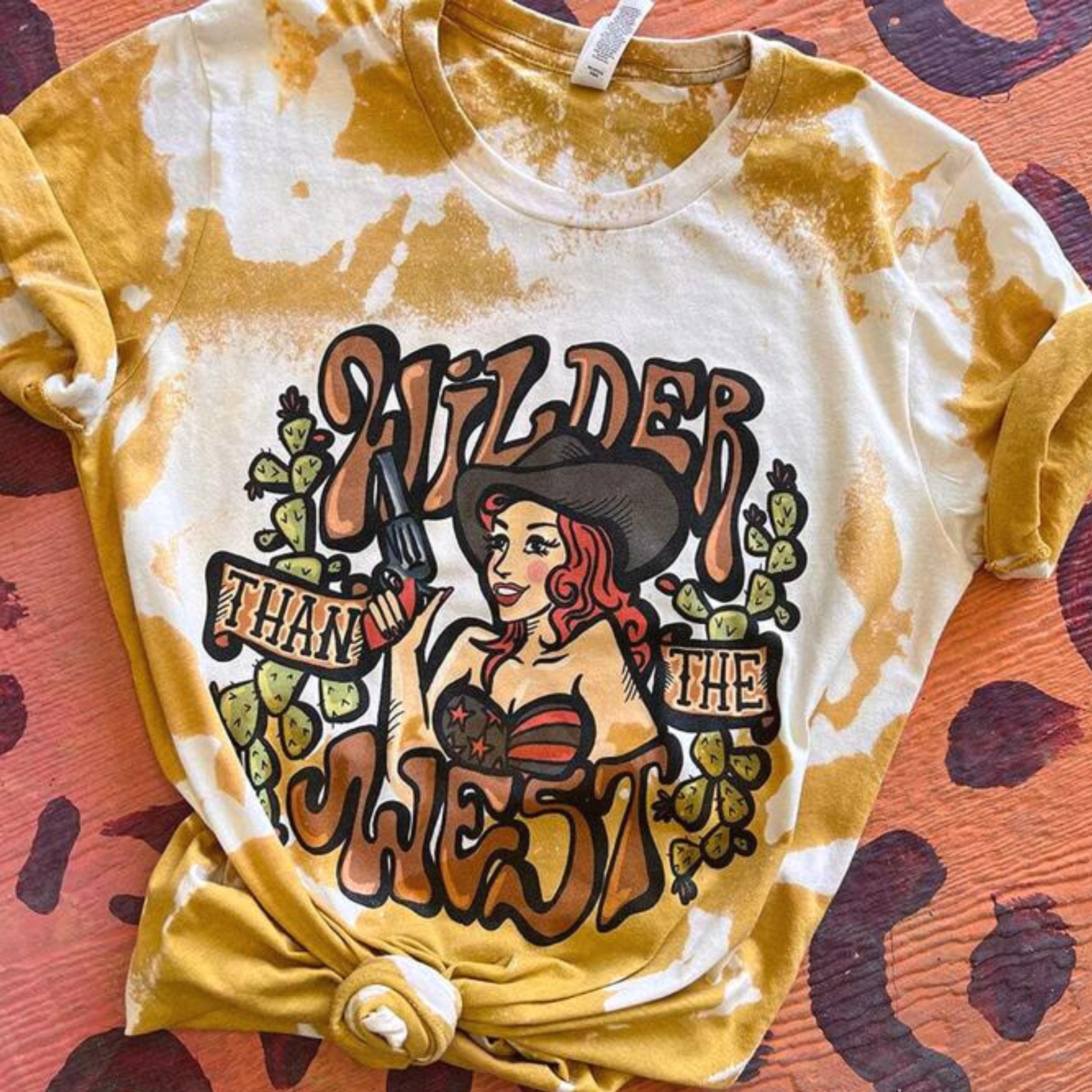 Online Exclusive | Wilder Than The West Short Sleeve Bleached Cowgirl Graphic Tee in Mustard - Giddy Up Glamour Boutique