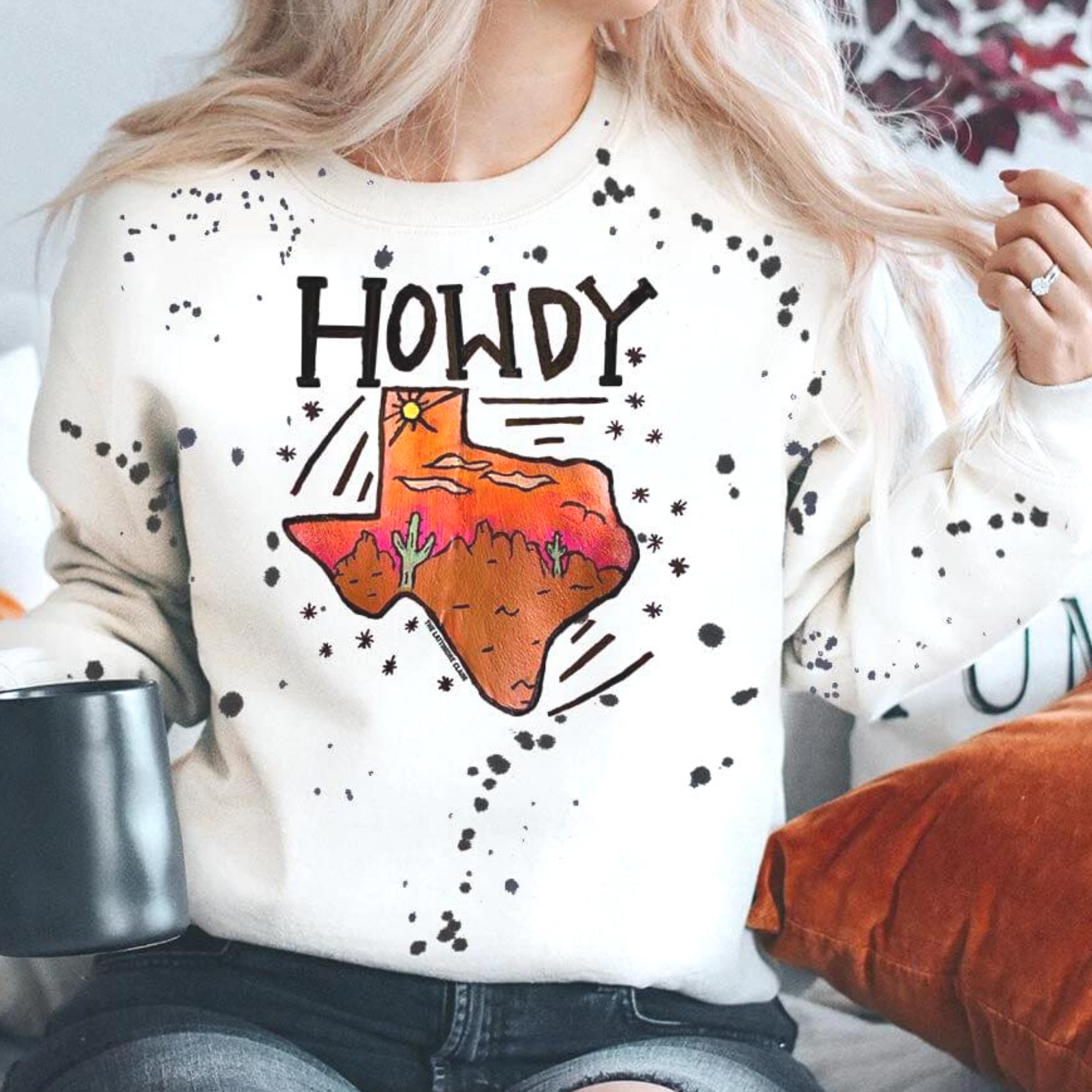 Online Exclusive | You Ain't Met My Texas Yet Long Sleeve Splatter Paint Howdy Graphic Sweatshirt in White - Giddy Up Glamour Boutique