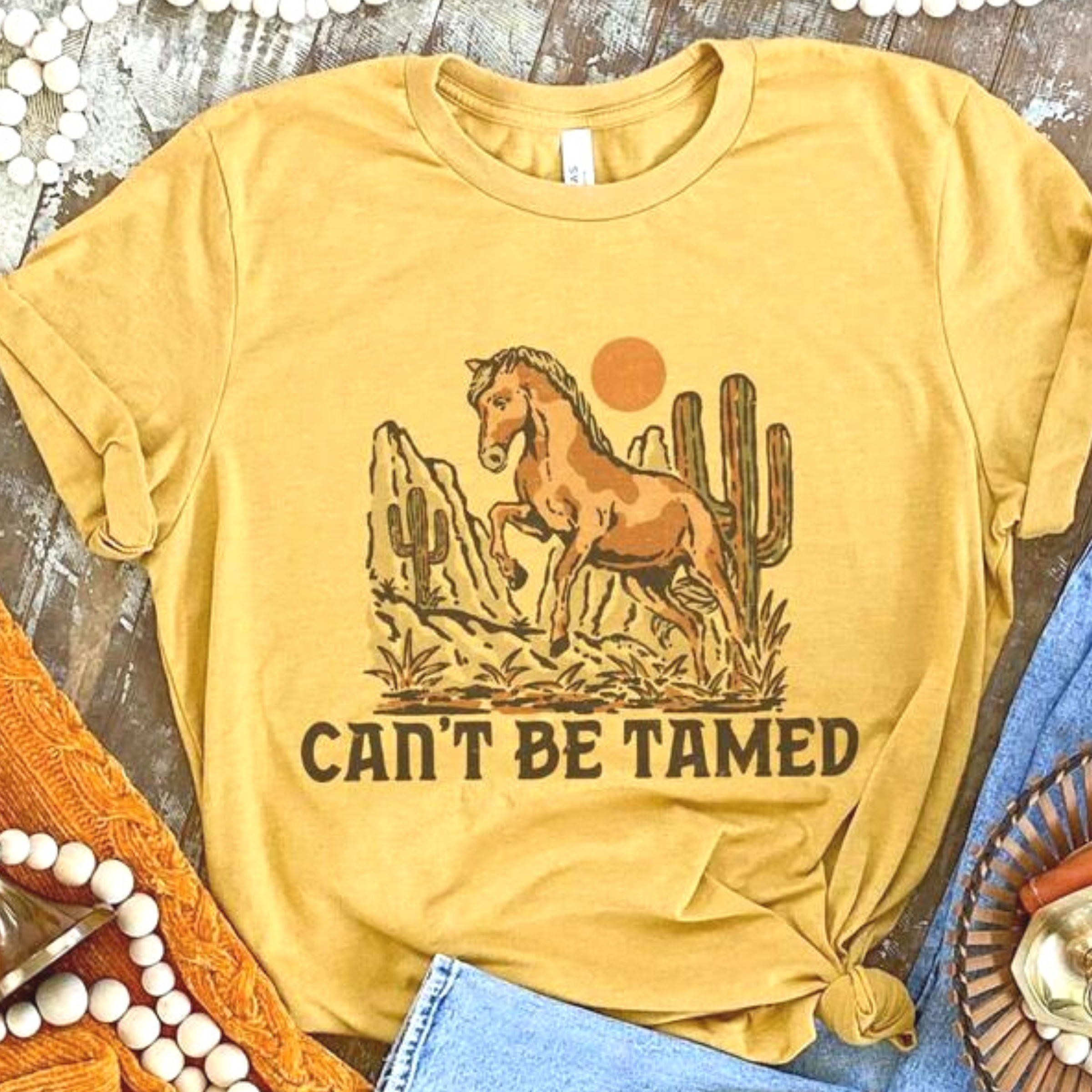 Online Exclusive | Can't Be Tamed Short Sleeve Graphic Tee in Mustard Yellow - Giddy Up Glamour Boutique