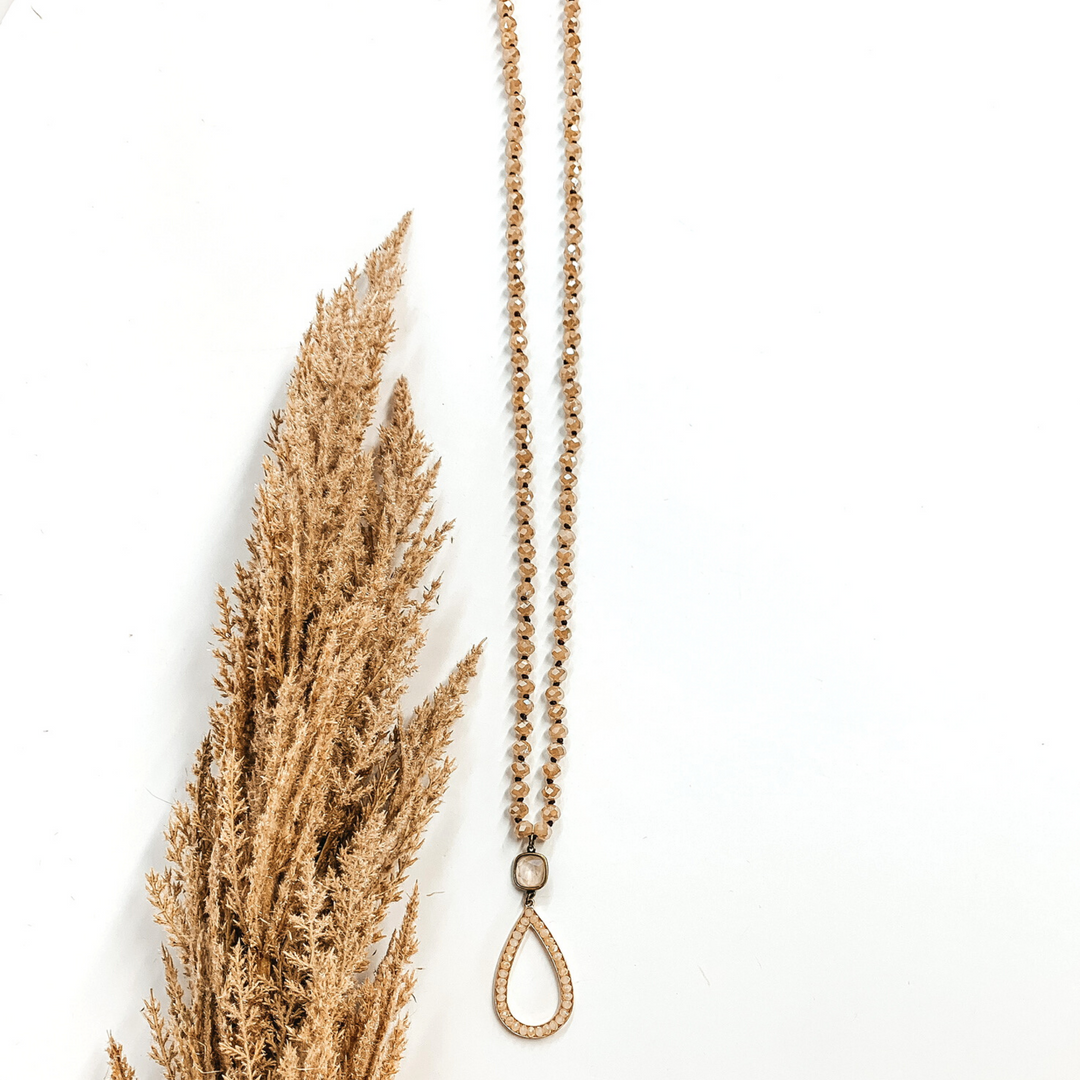 Pink Panache | Caramel Crystal Beaded Necklace with Candy Ivory Beaded Teardrop on Cream Cushion Cut Crystal - Giddy Up Glamour Boutique