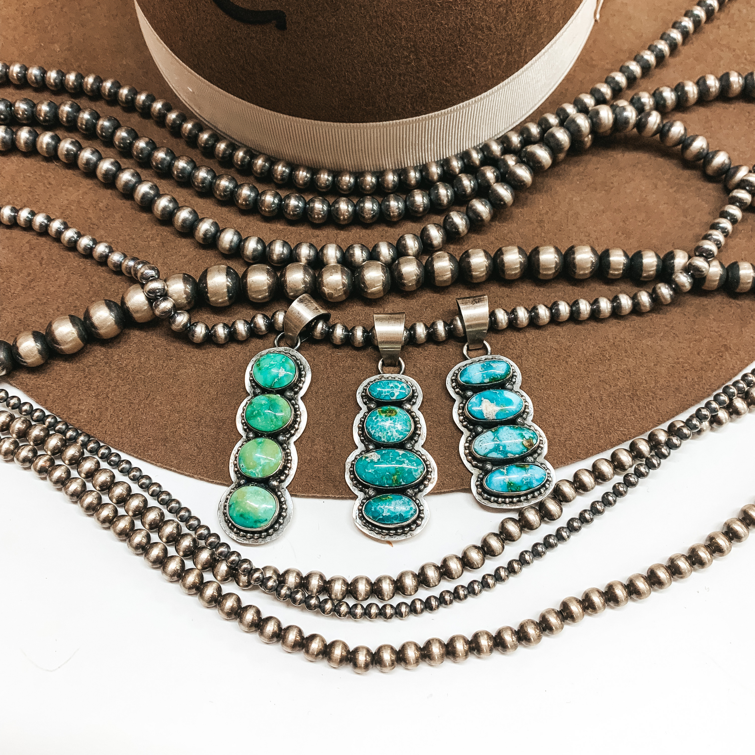 Scott Skeets | Navajo Handmade Sterling Silver Four Stone Sonoran Turquoise Pendant