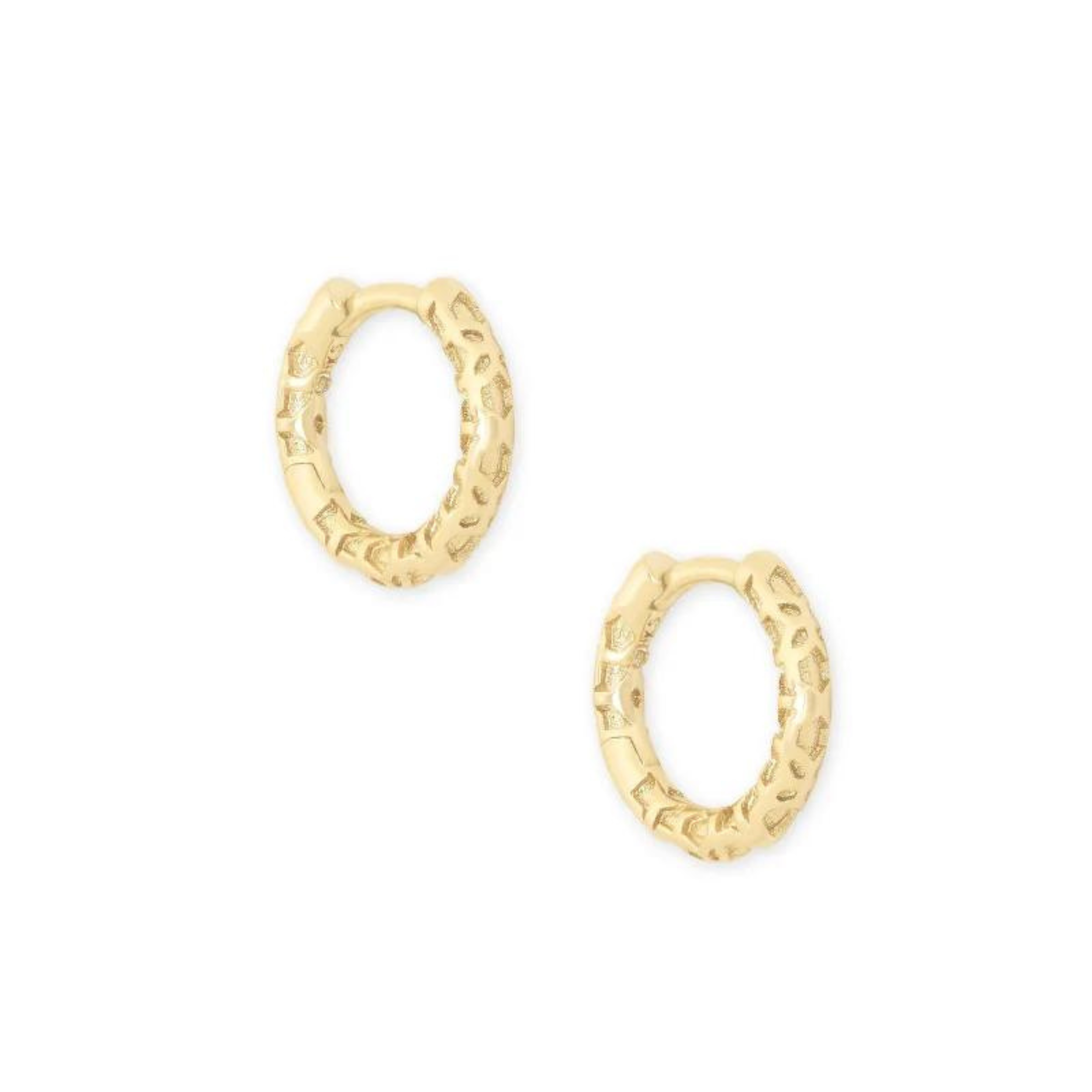 Gold huggie earrings with filigree detailing, pictured on a white background.