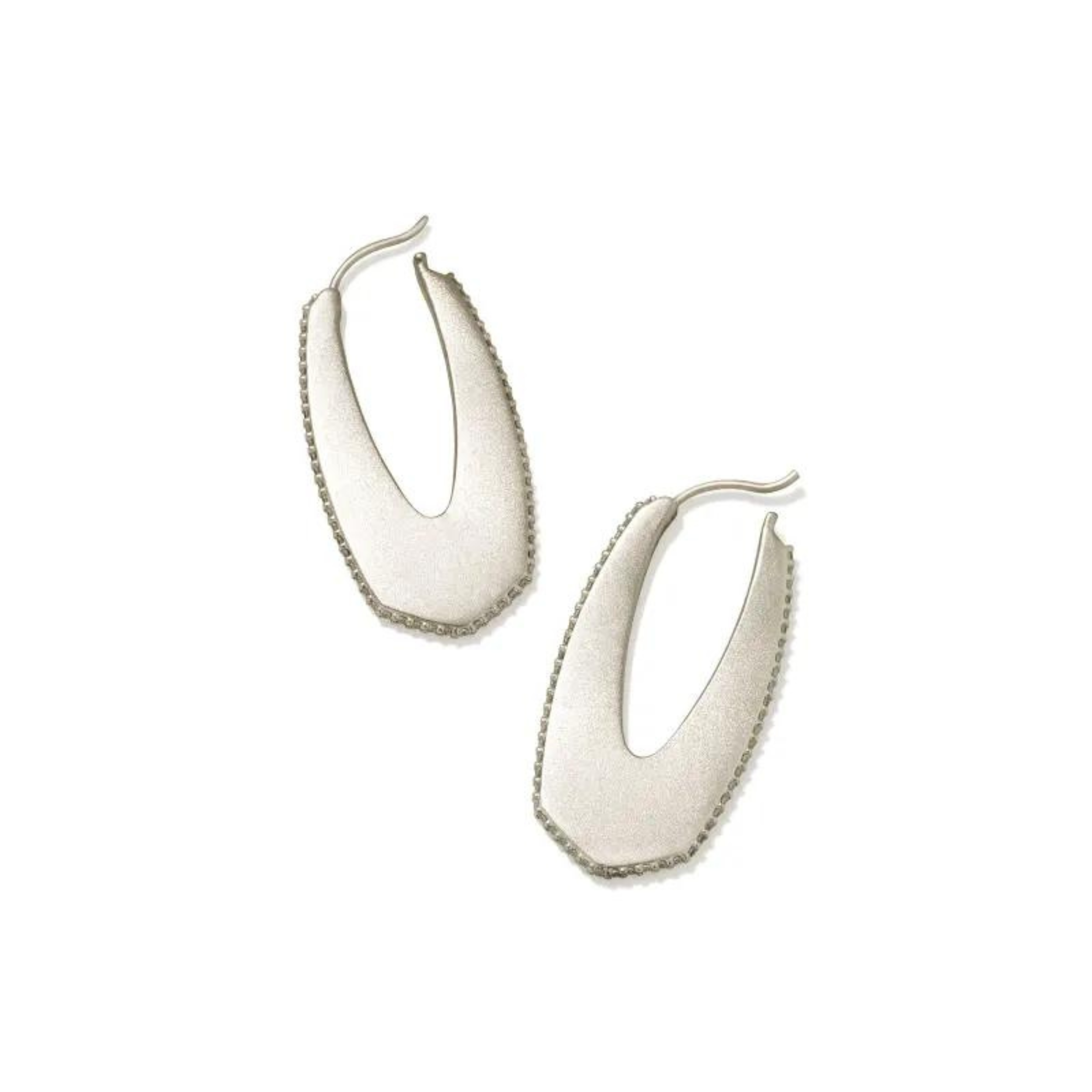 SIlver hoop earrings with white crystals, pictured on a white background.