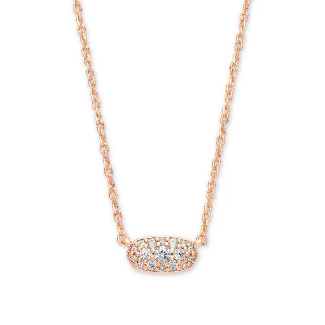 Rose gold necklace with white crystals, pictured on a white background.