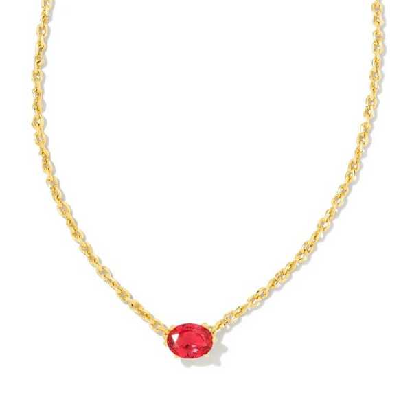 Gold chain necklace with a red crystal pendant, pictured on a white background.