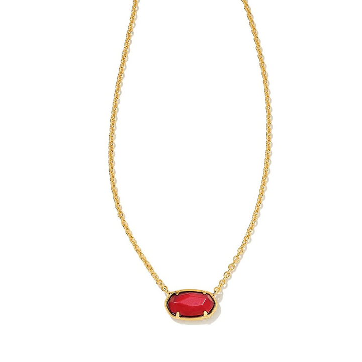 Gold chain necklace with maroon magnesite pendant, pictured on a white background.