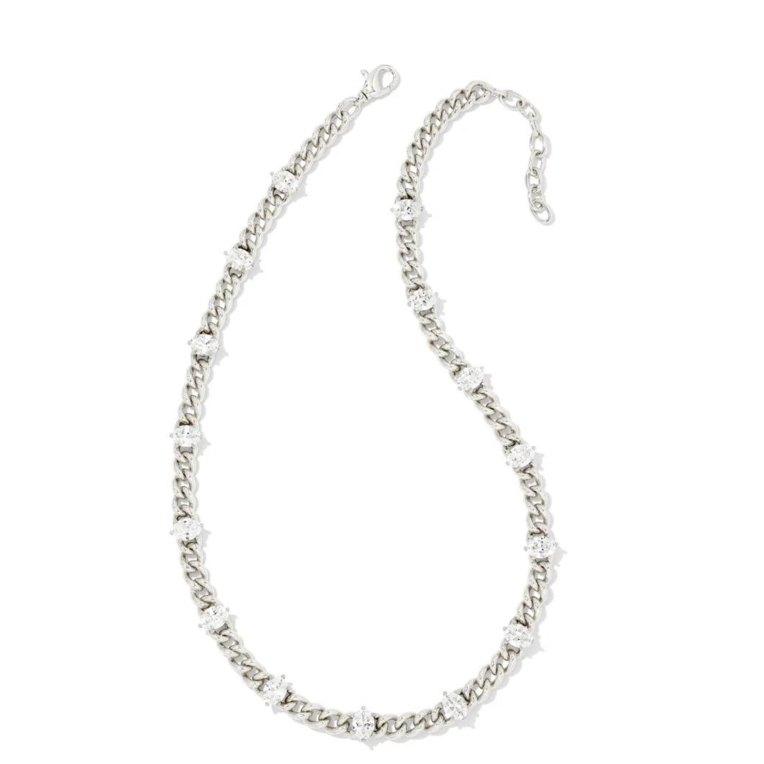 Silver chain necklace with white crystals, pictured on a white background.