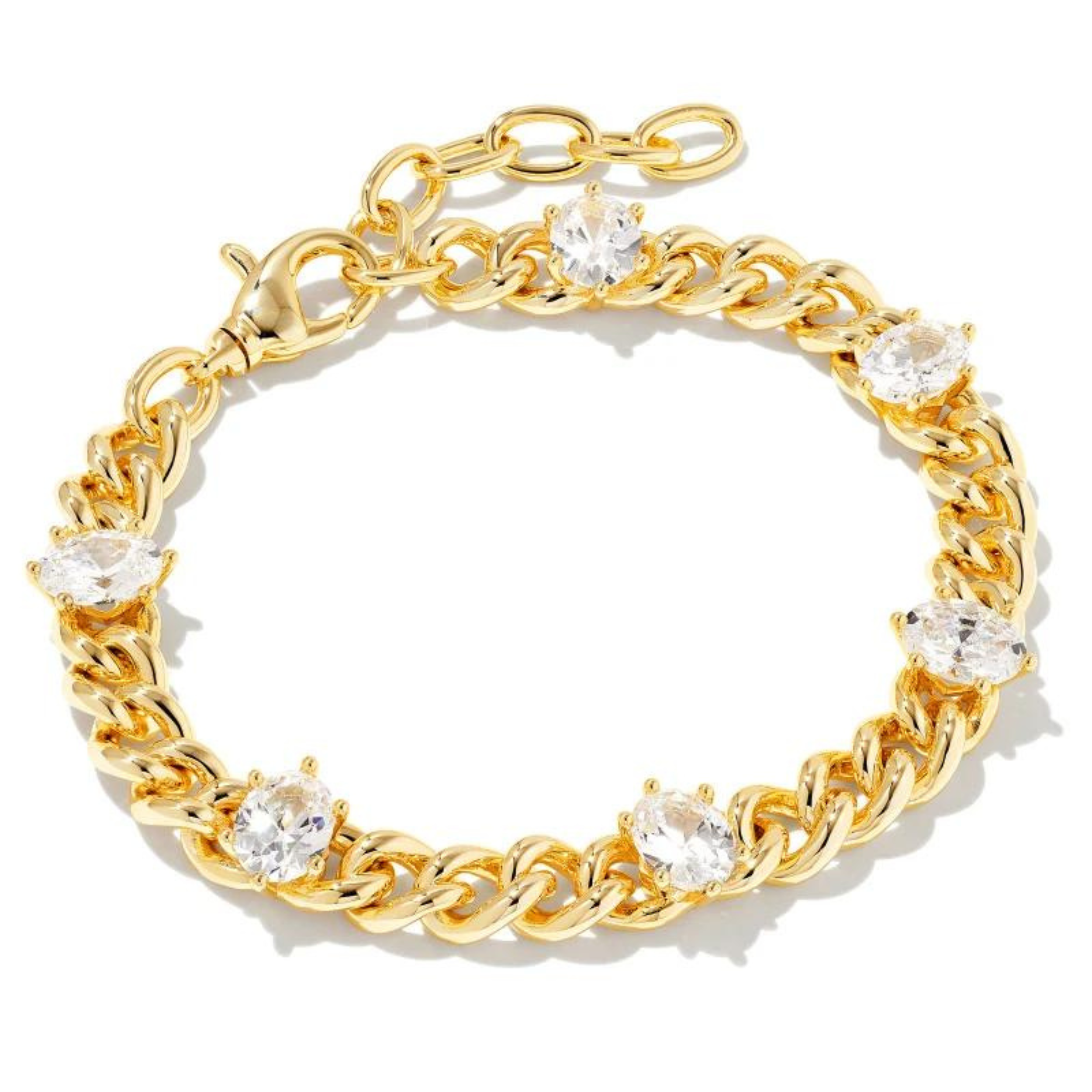 Gold chain bracelet with white crystals, pictured on a white background.