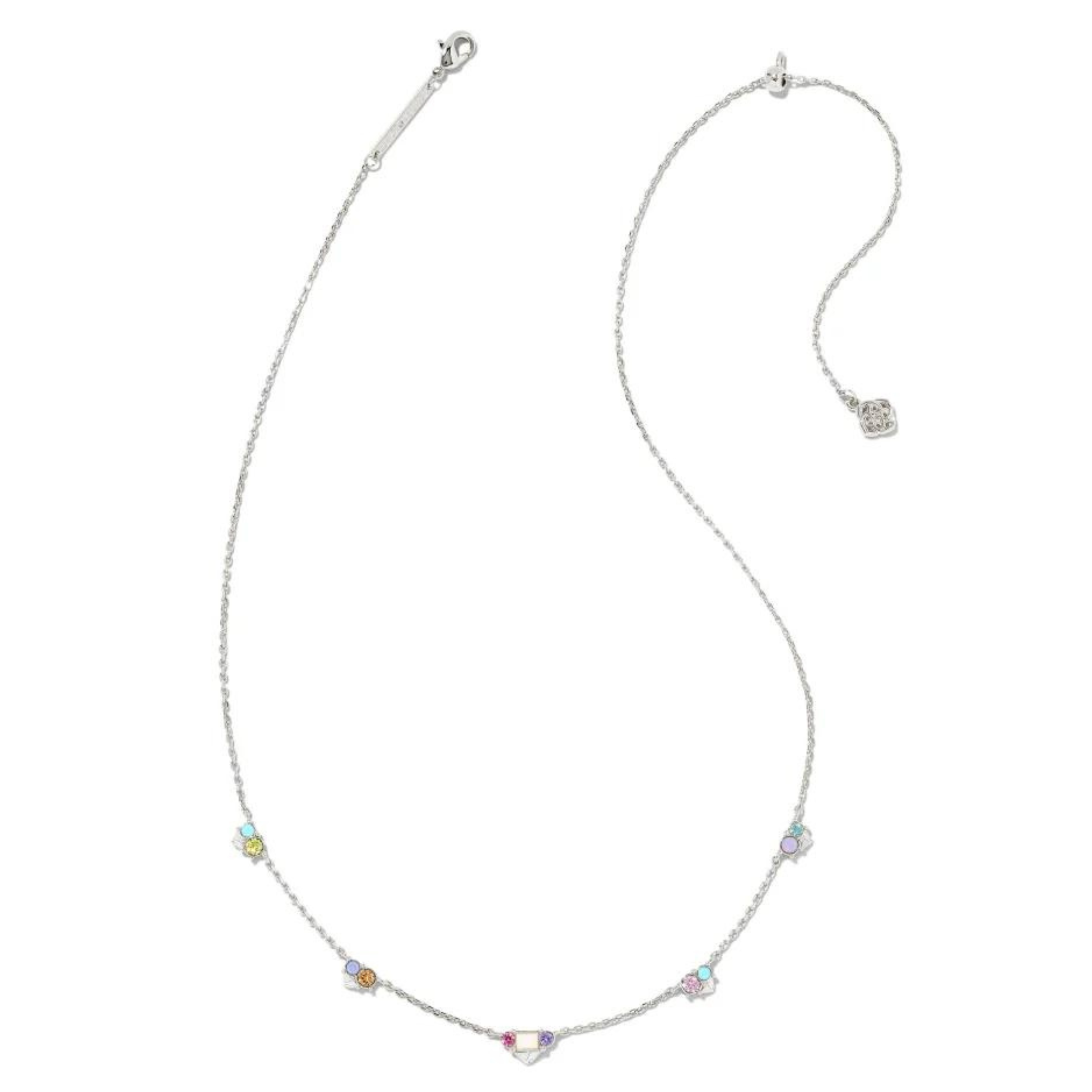 Silver necklace with pastel crystals, pictured on a white background.