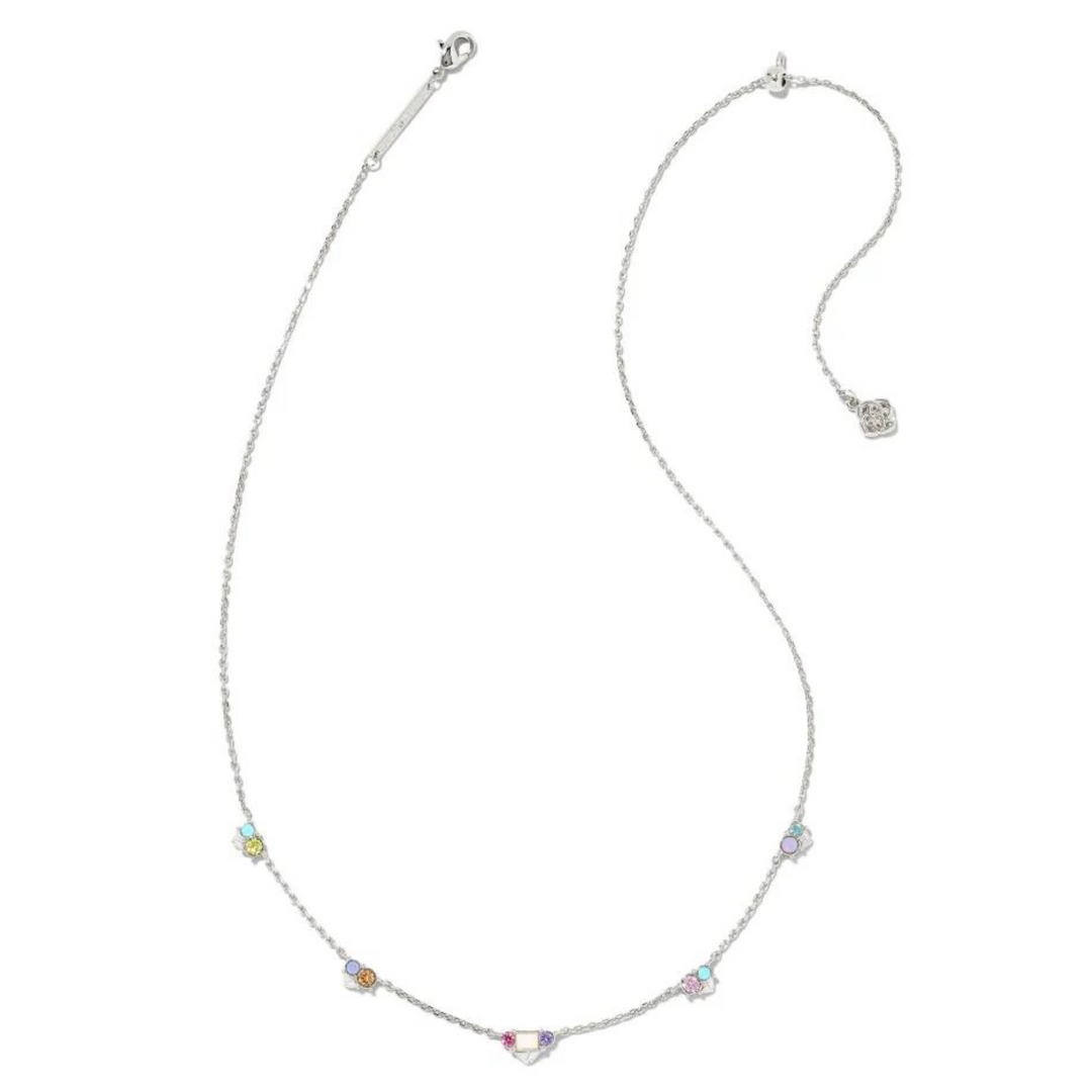 Silver necklace with pastel crystals, pictured on a white background.