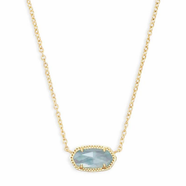 Gold necklace with light blue illusion pendant, pictured on a white background.