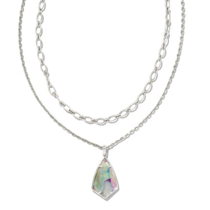 Silver multi strand necklace with a lilac abalone pendant, pictured on a white background.