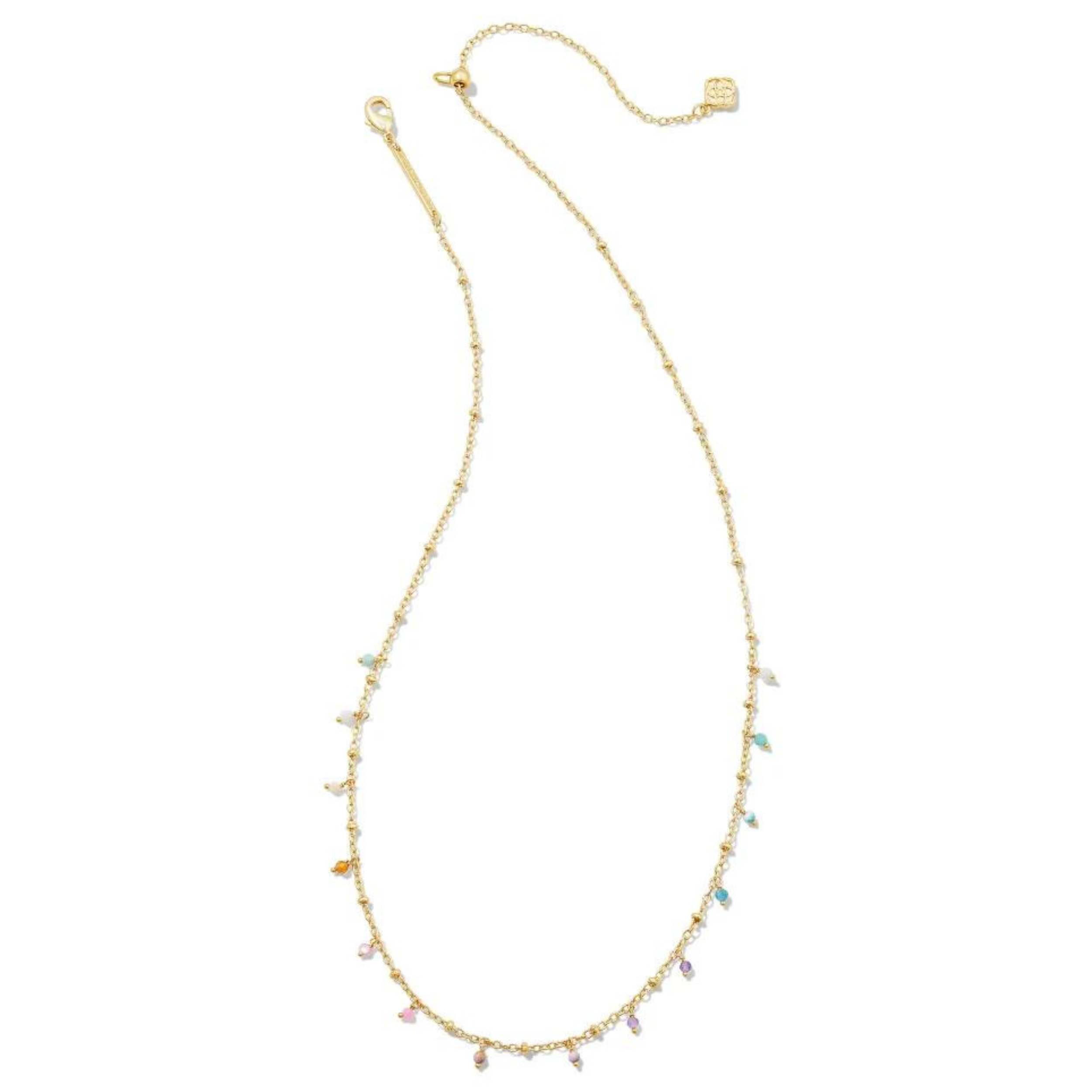 Gold strand with pastel mix beads, pictured on a white background.