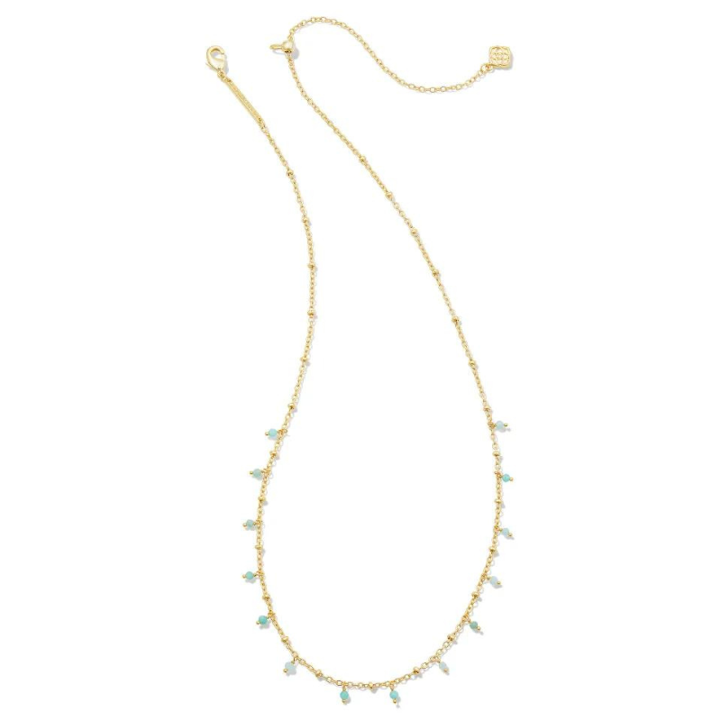 Gold necklace with teal amazonite beads, pictured on a white background.