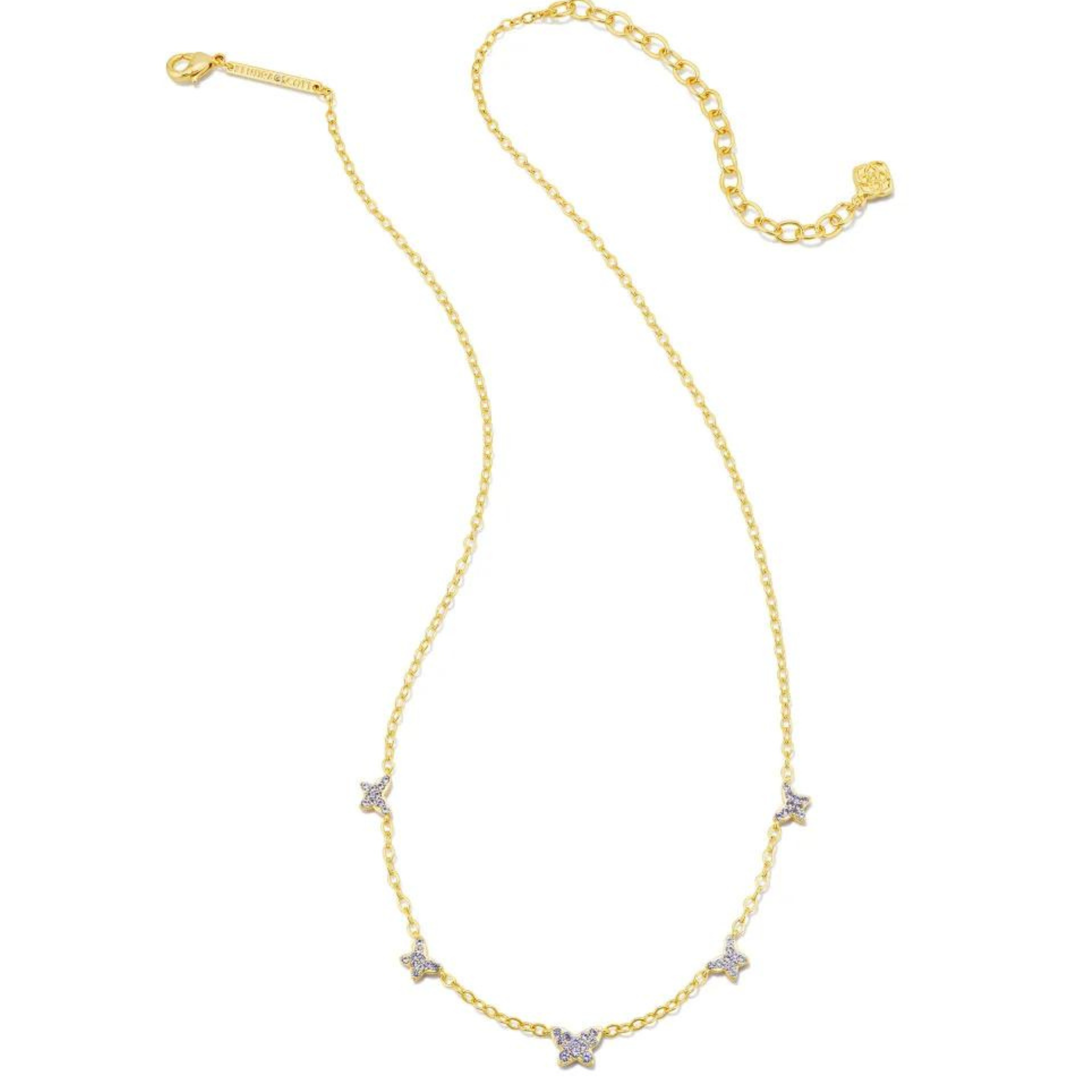 Gold necklace with 5 violet crystal butterflies, pictured on a white background.