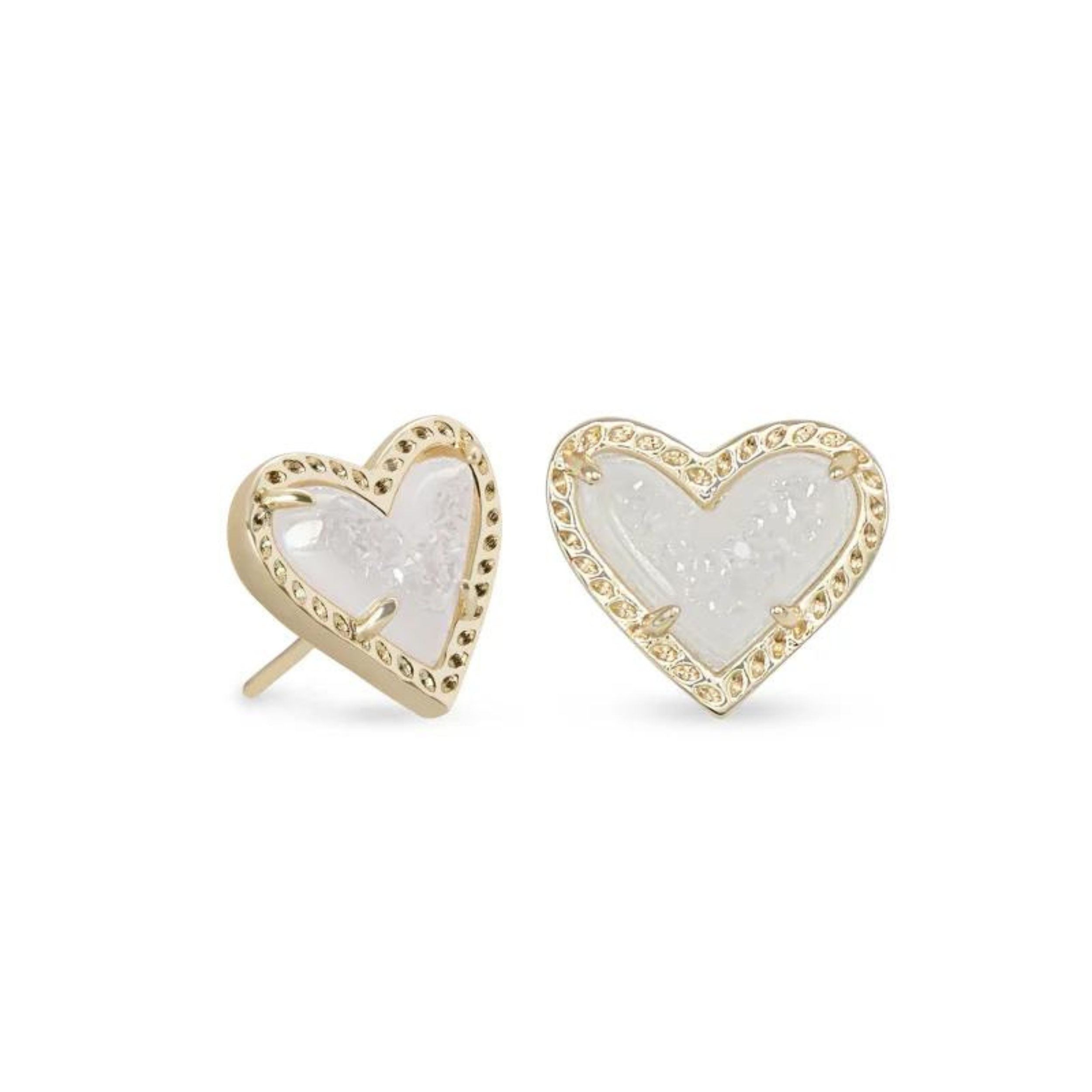 Gold and crustal heart shaped earrings pictured on a white background.
