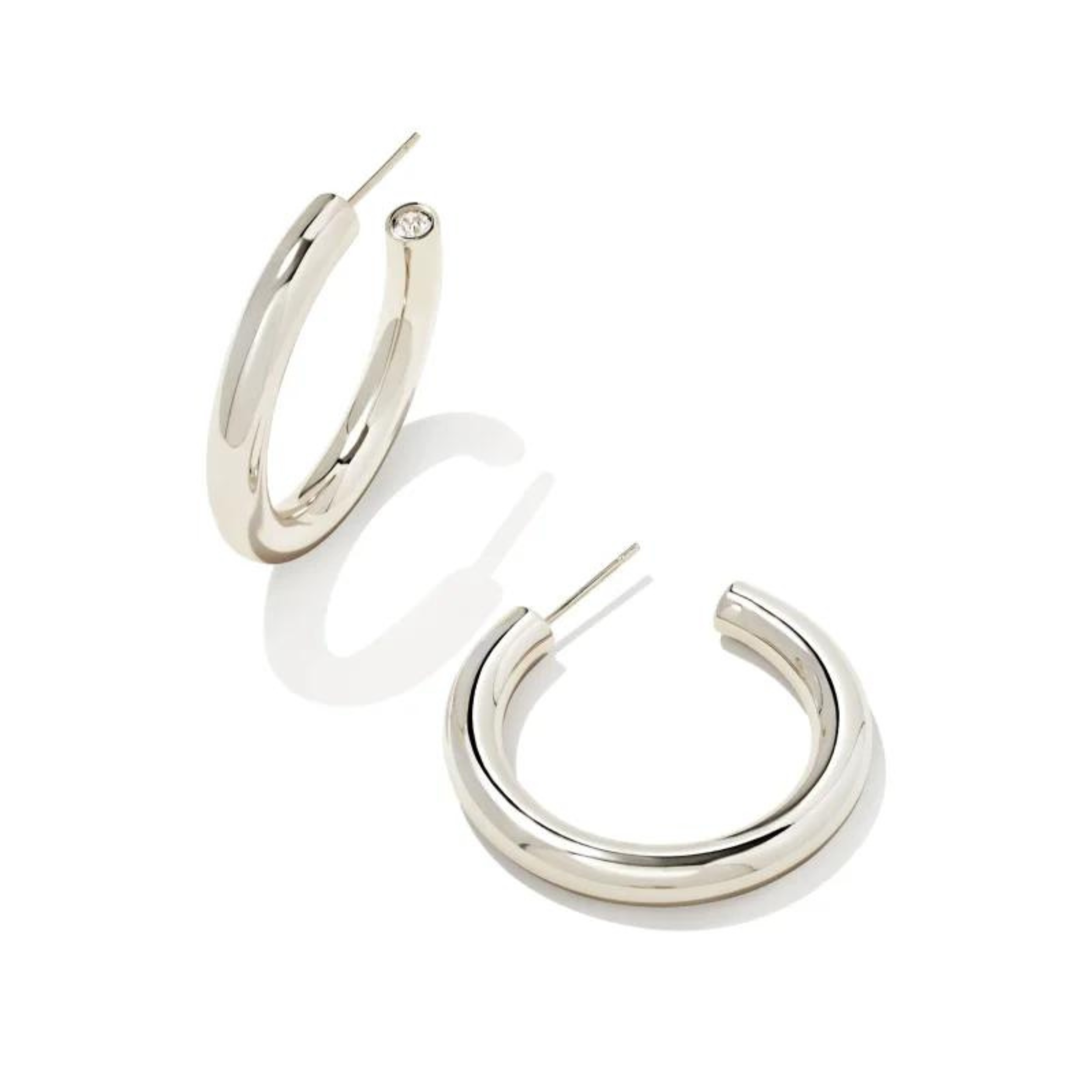Silver hoop earrings pictured on a white background.