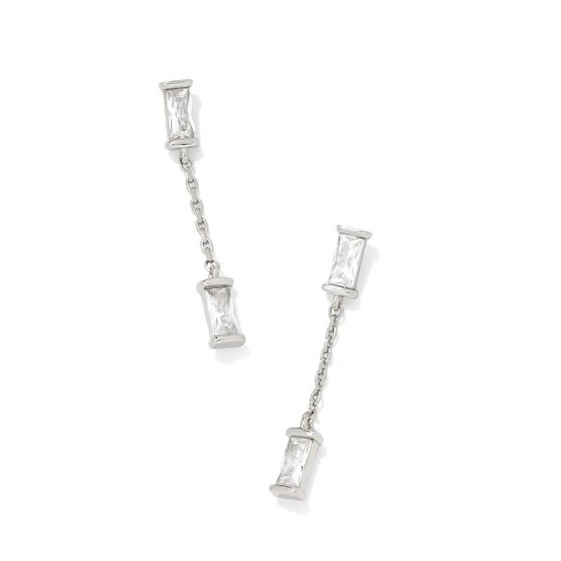 Silver white crystal dangle earrings, pictured on a white background.
