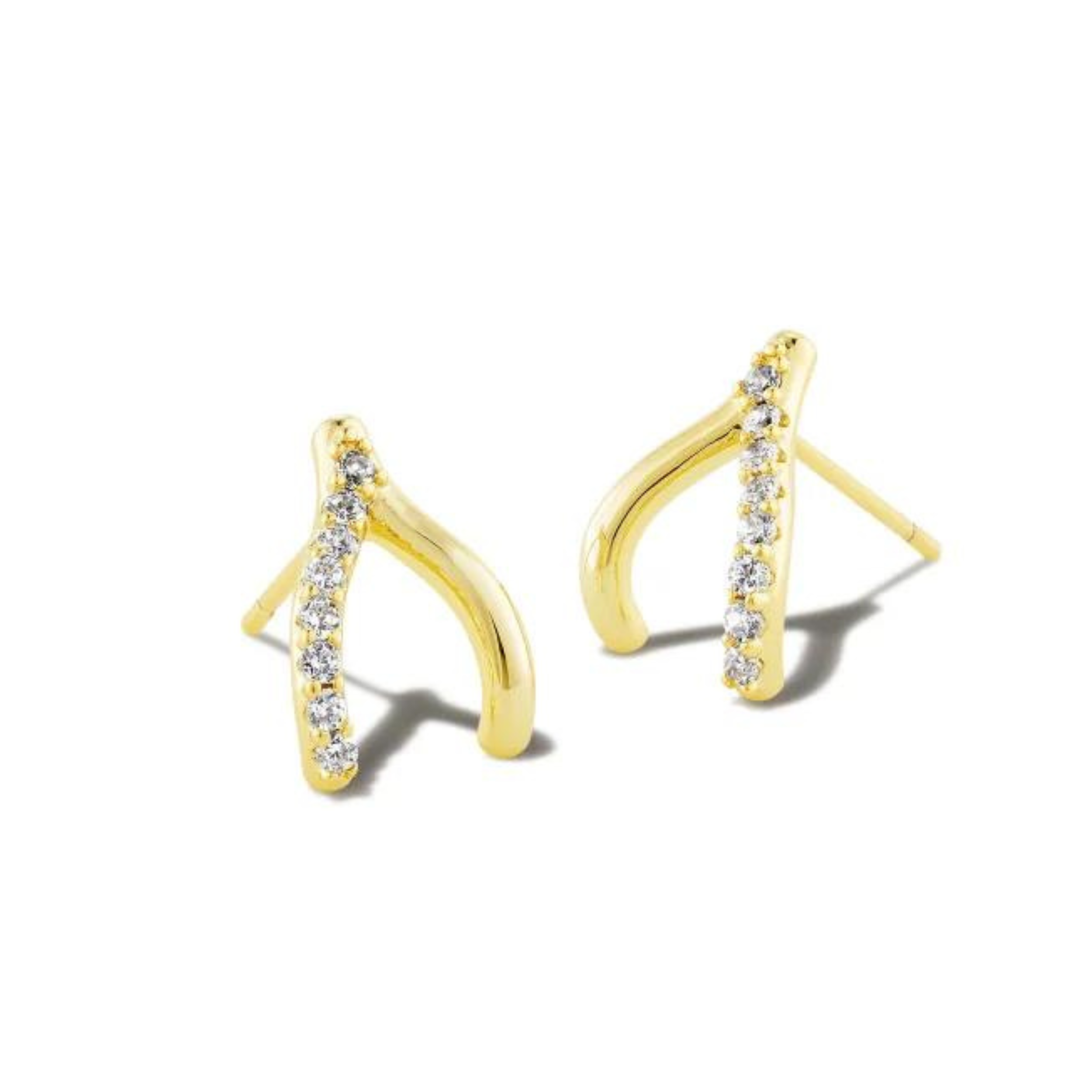 Gold wishbone earrings with white crystals pictured on a white background.